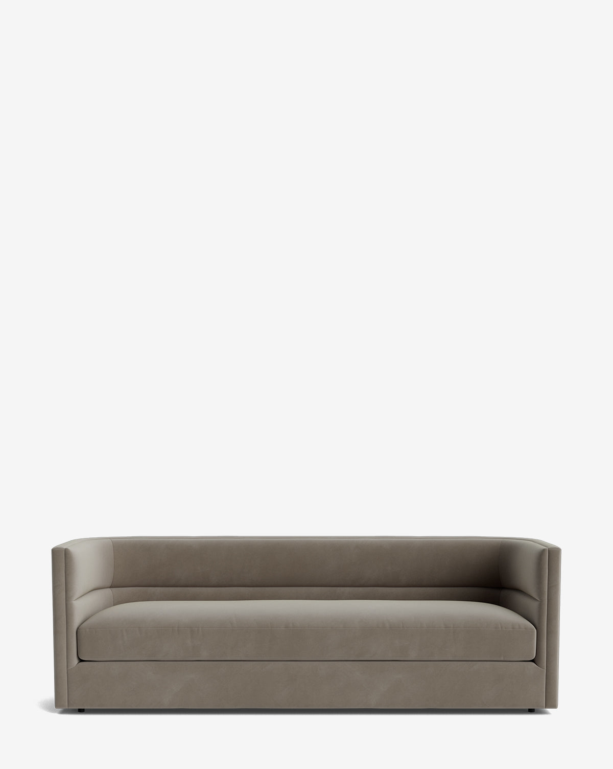 The Claremont Sofa 84 is a modern grey sofa with low, straight arms and a cushioned seat, upholstered in premium fabric and displayed against a plain white background by McGee & Co.