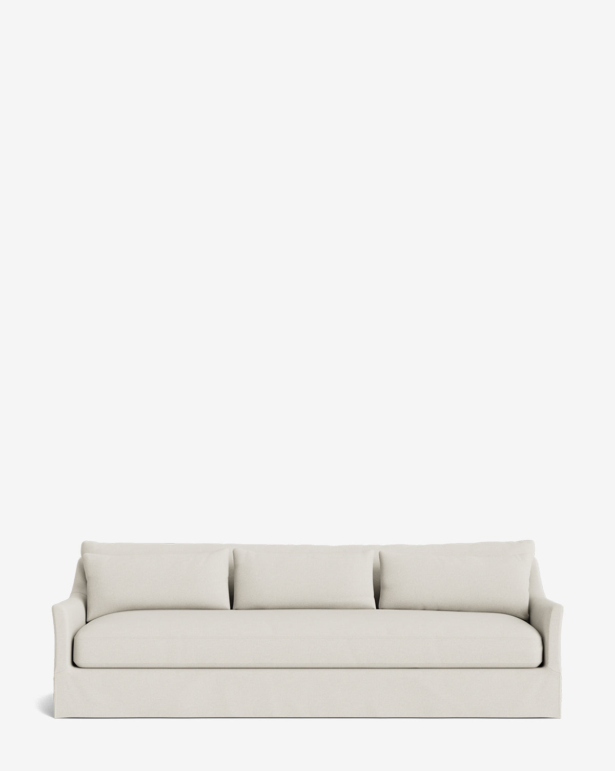 The Wilhelmina Classic Slipcover Sofa (85-110) is a modern, light beige sofa with three seat and back cushions, slightly curved arms, and a minimalist design, shown against a plain white background by McGee & Co.