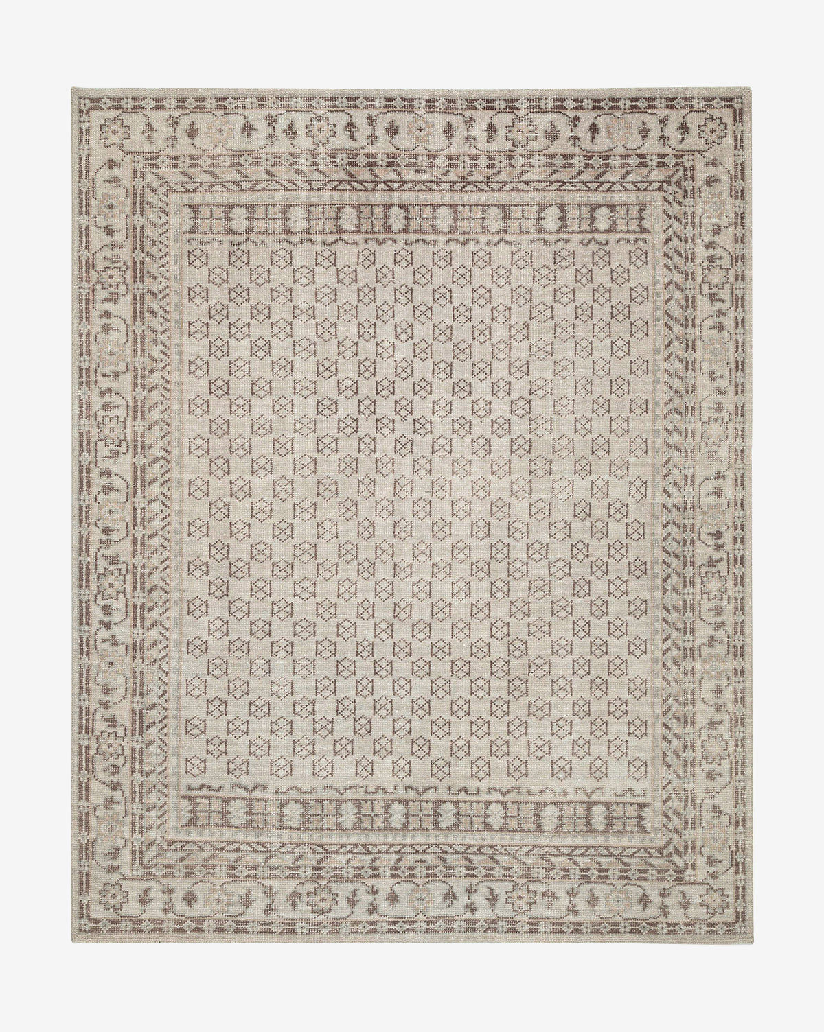 The Anya Neutral Hand-Knotted Wool Rug features a durable beige background with intricate geometric and floral patterns in light brown and taupe, framed by a detailed, symmetrical border by McGee & Co.