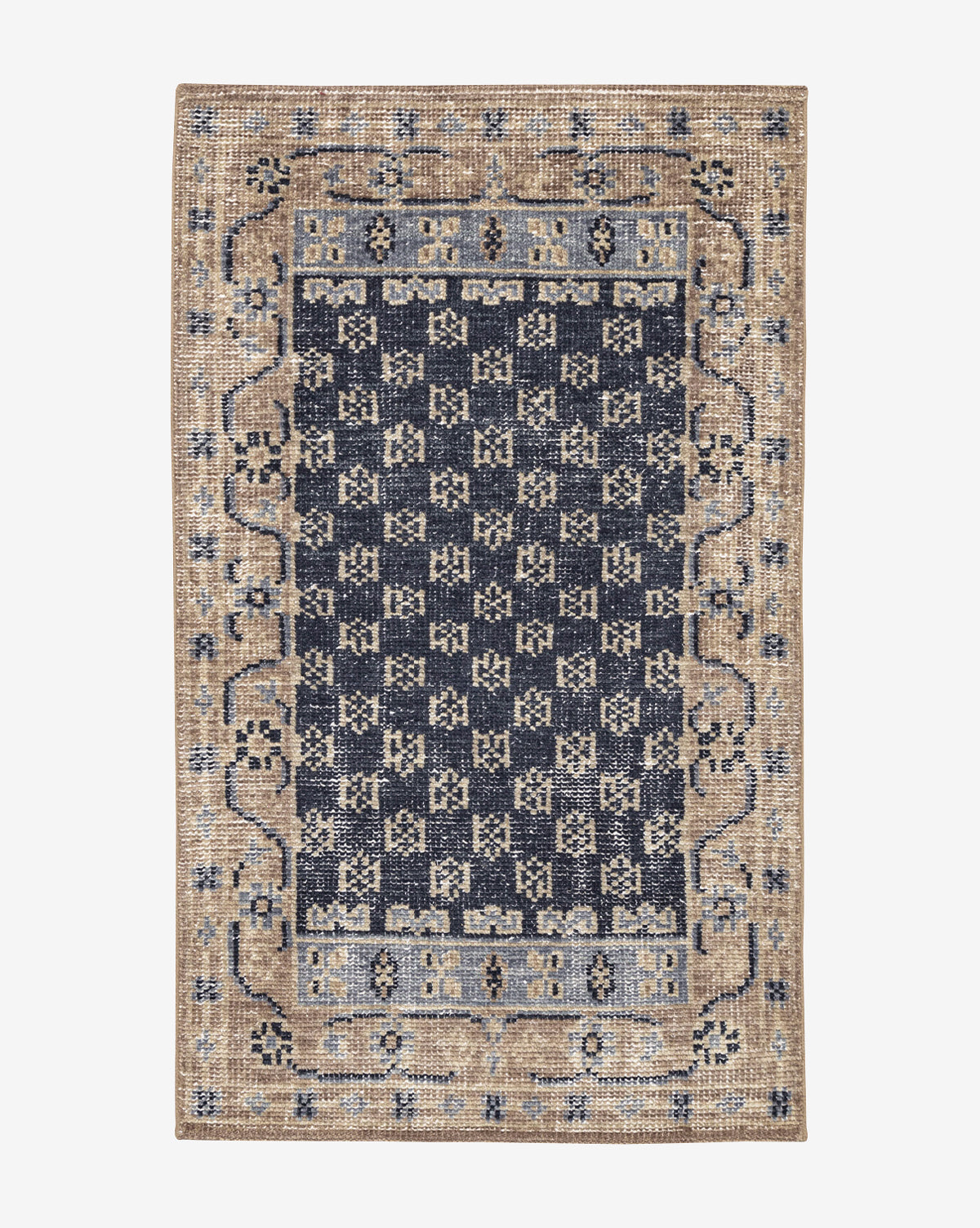 The Anya Indigo Hand-Knotted Wool Rug is a rectangular wool piece featuring navy and beige geometric and floral patterns, a checkered center, ornate border, and a slightly distressed vintage look, by McGee & Co.