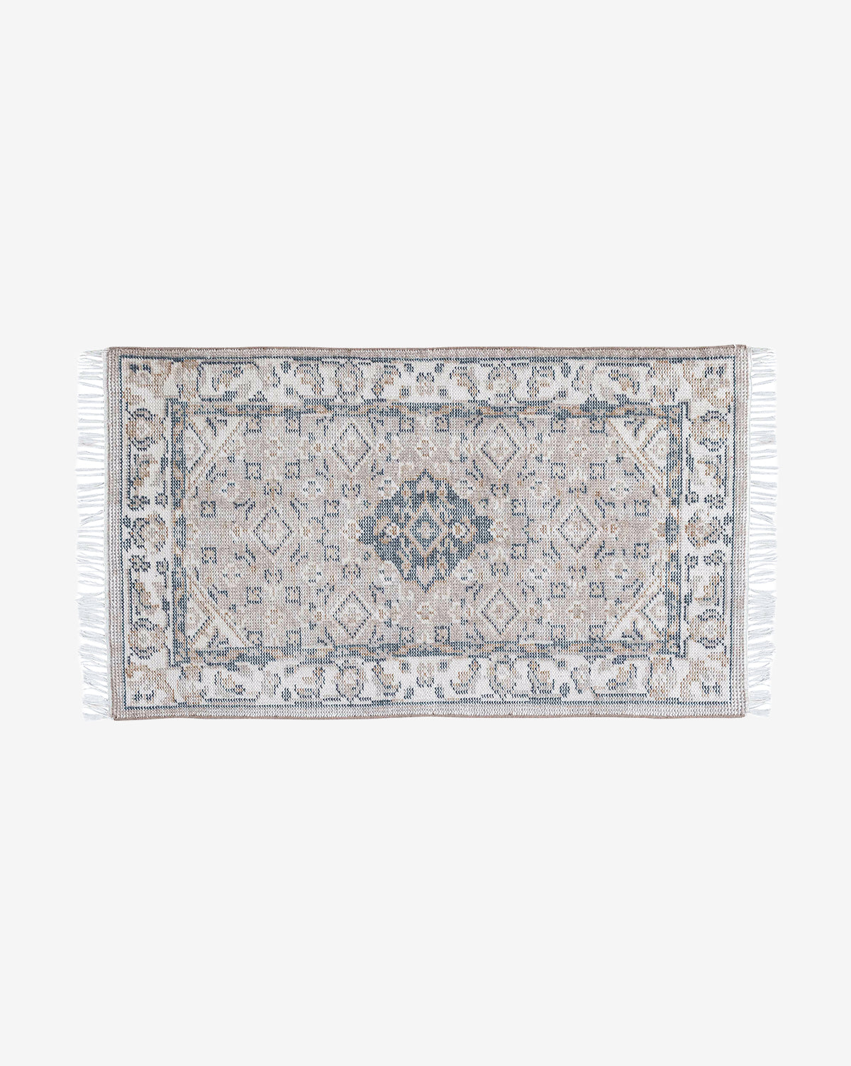 The Merilyn Hand-Knotted Rug is a rectangular, high-quality polyester piece featuring a detailed geometric and floral pattern in muted beige, gray, and blue with white fringes on the short ends, set against a light background, by McGee & Co.