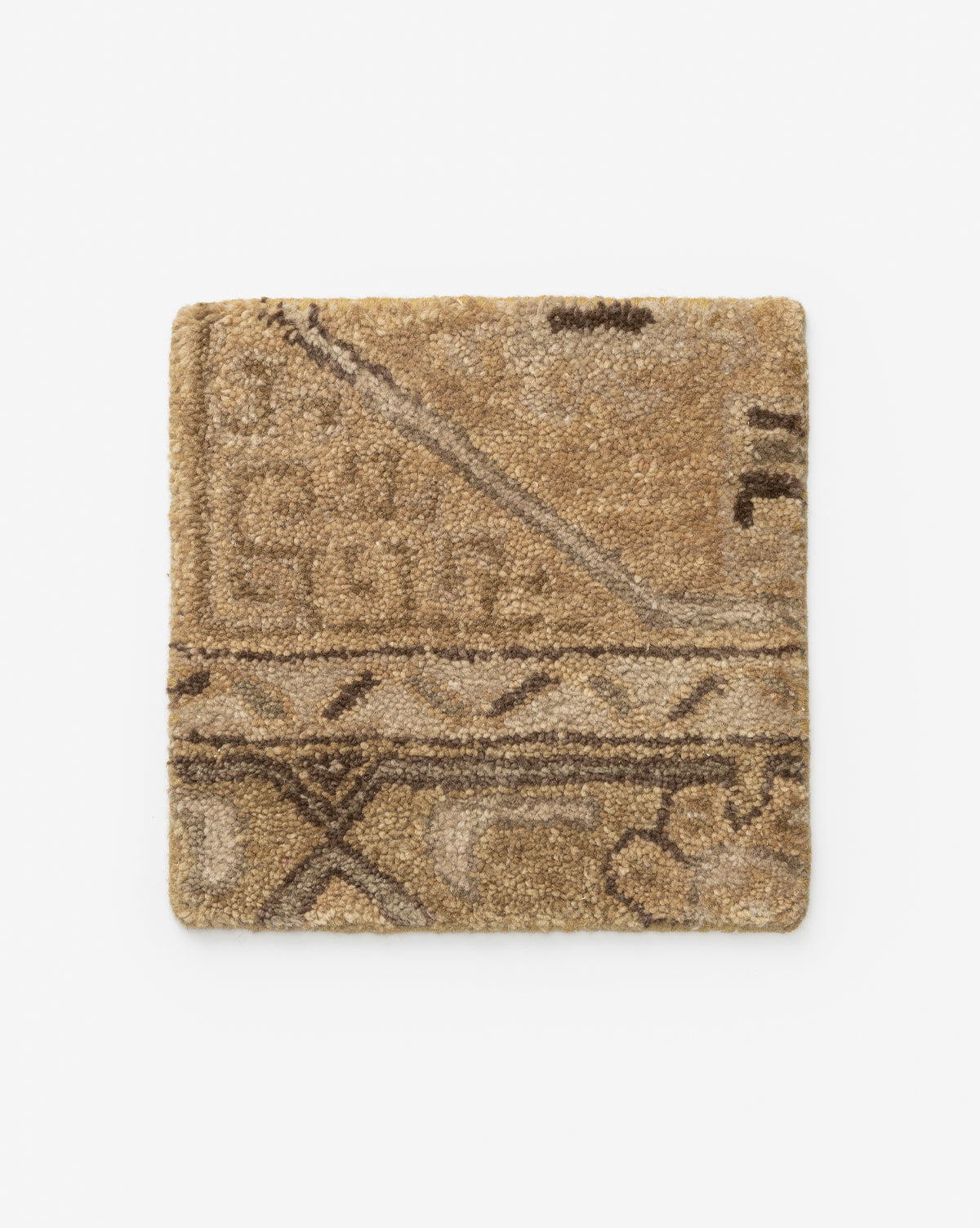 The Ellington Fawn Hand-Tufted Wool Rug Swatch features a square sample in tan and brown with a geometric, abstract pattern, inspired by tribal designs, displayed on a plain white background.