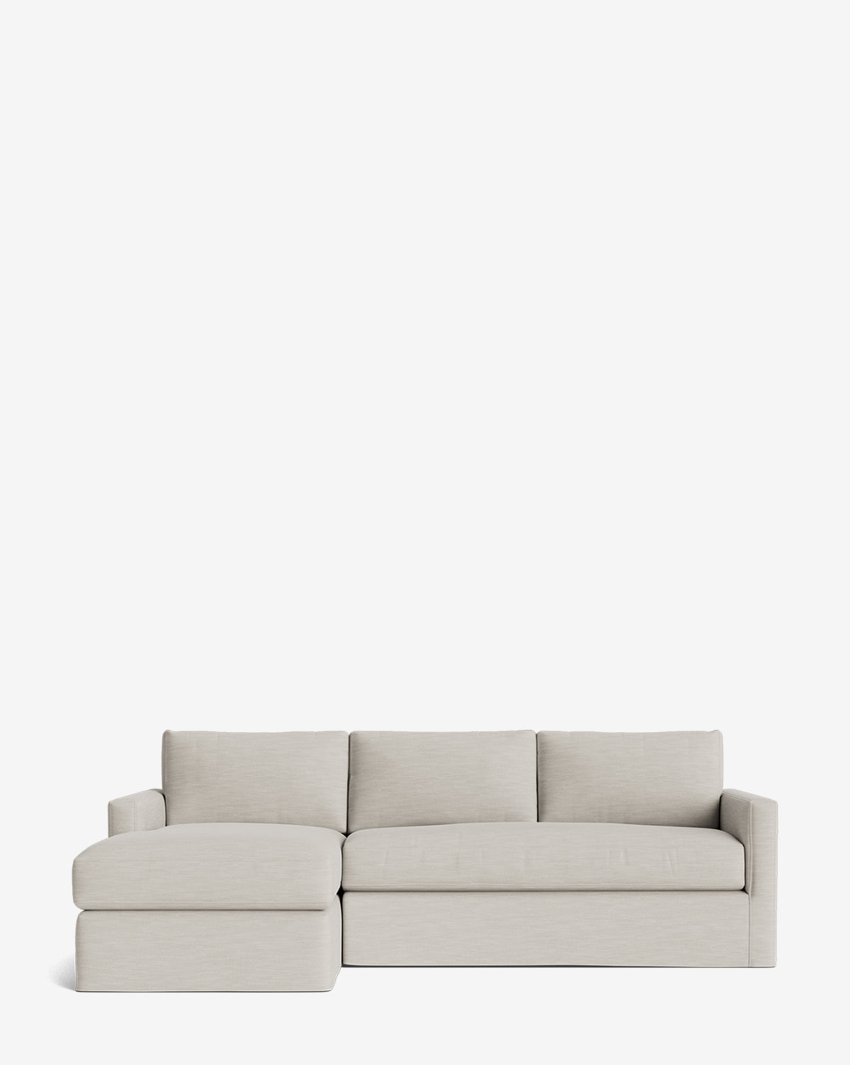 The Community Macy Slipcover Chaise Sectional 101 in light gray features three back cushions, a left-side chaise lounge, square arms, and clean lines, shown against a plain white background. McGee & Co.