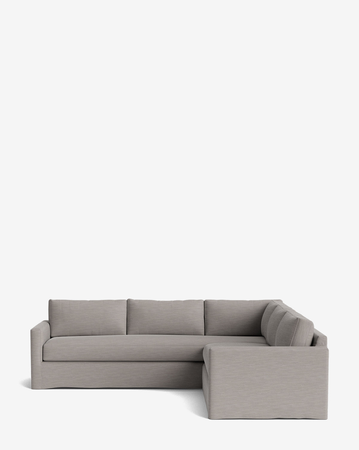 The Macy Slipcover L Sectional 108 features a modern, light gray design with low, straight arms and deep cushions, shown against a plain white background by McGee & Co.