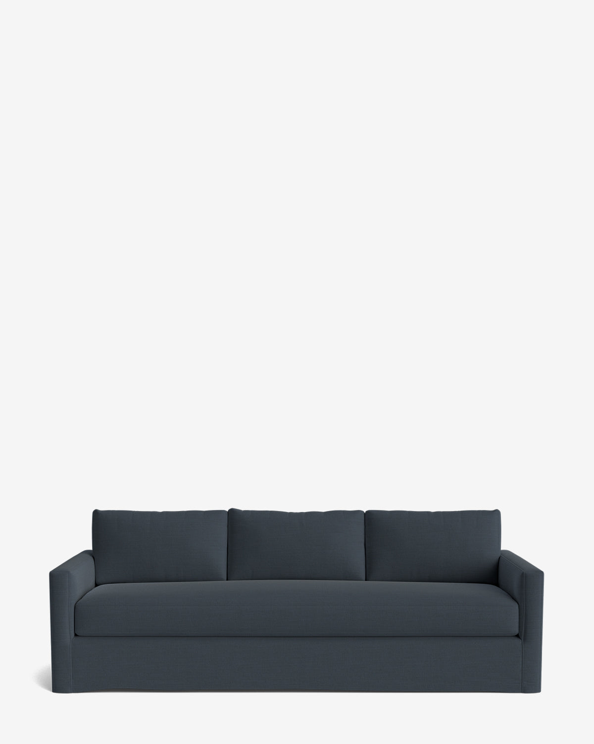 The Macy Slipcover Sofa (84-96) features a modern design with straight arms, three back cushions, and a deep dark blue hue—ideal for anyone seeking comfort and style against a sleek white backdrop, by McGee & Co.