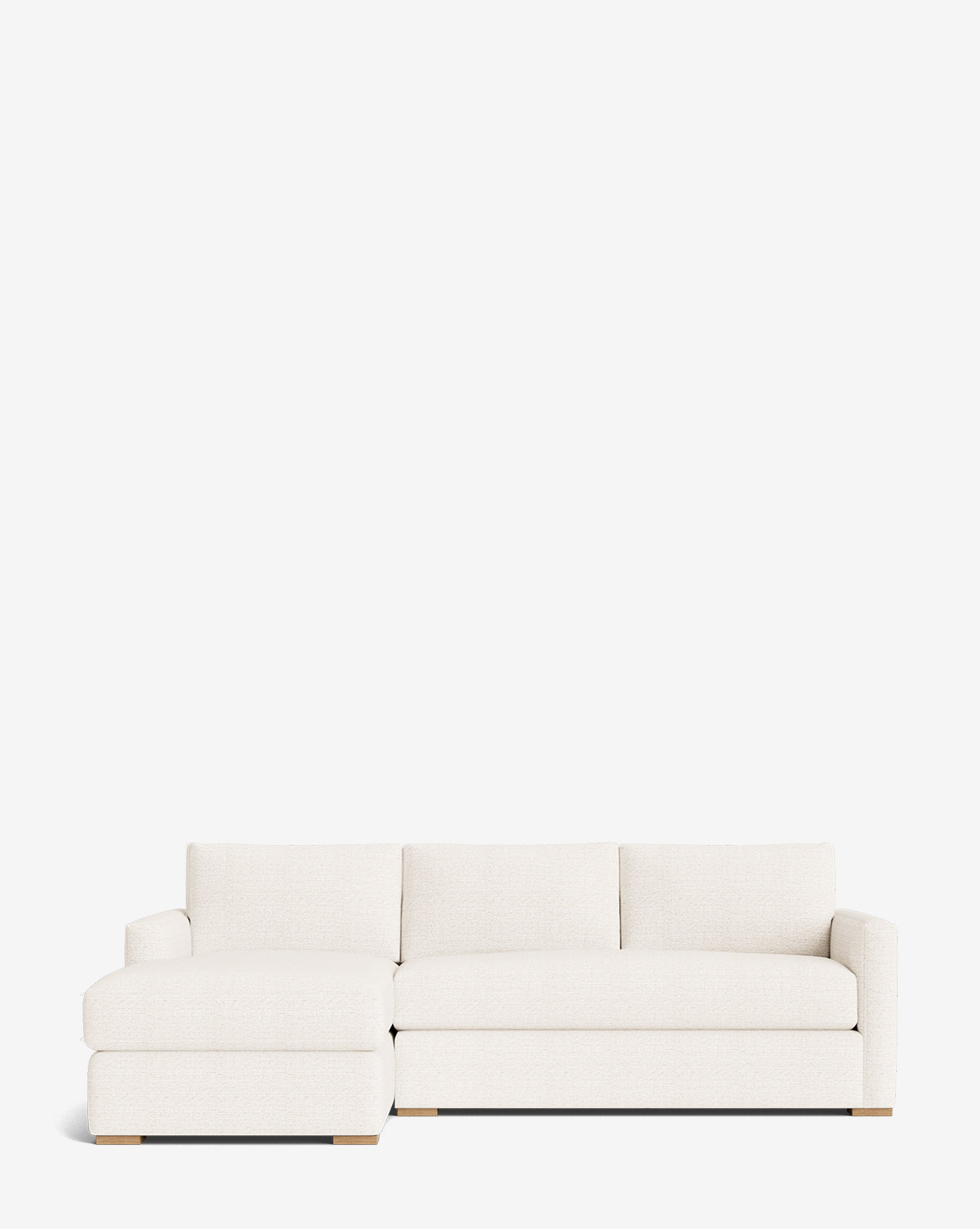 The Community Macy Upholstered Chaise Sectional 101 features a left-side lounge and off-white fabric, blending luxury and comfort for modern spaces. Shown on a clean white background. McGee & Co.