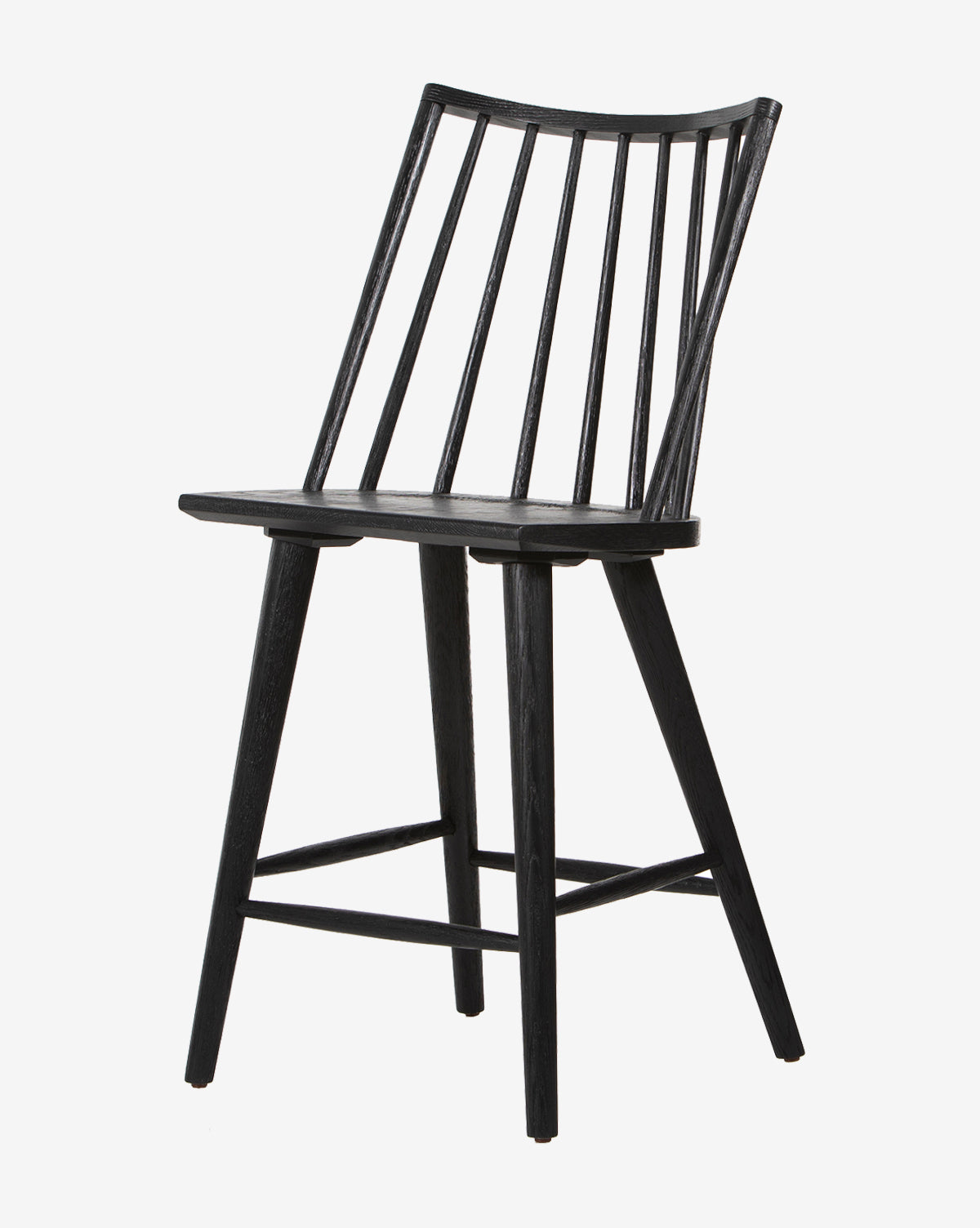 The Madison Stool, crafted from black wood, features a slightly curved backrest with vertical slats, four angled legs, and horizontal support bars. Displayed against a plain white background.