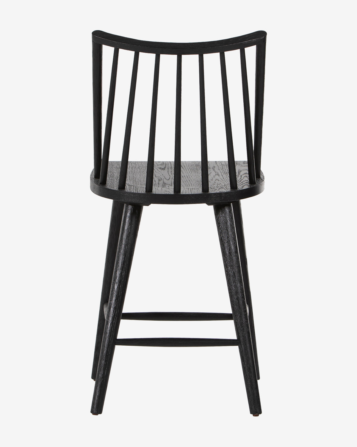 The Madison Stool is shown from behind against a plain white background, featuring a black wooden finish, curved slatted backrest, and four angled legs.
