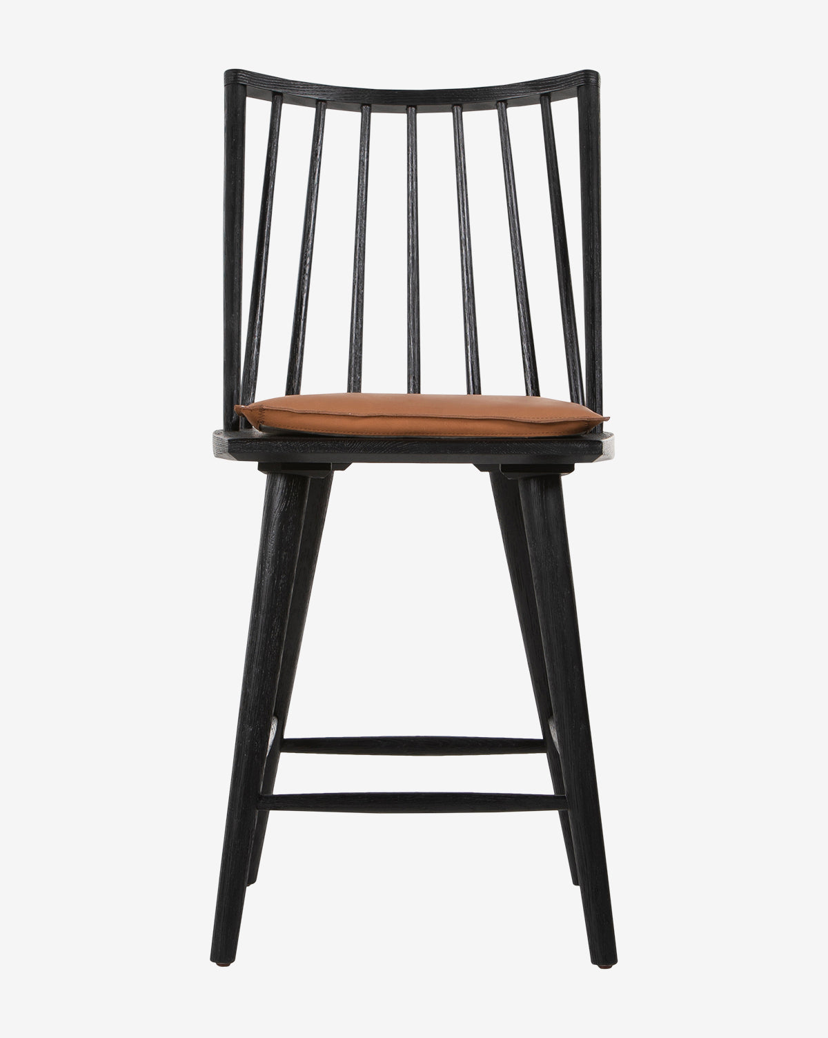 The Madison Stool, a black wooden Windsor stool with a spindle back, four angled legs, and a brown seat cushion, is displayed against a plain white background.
