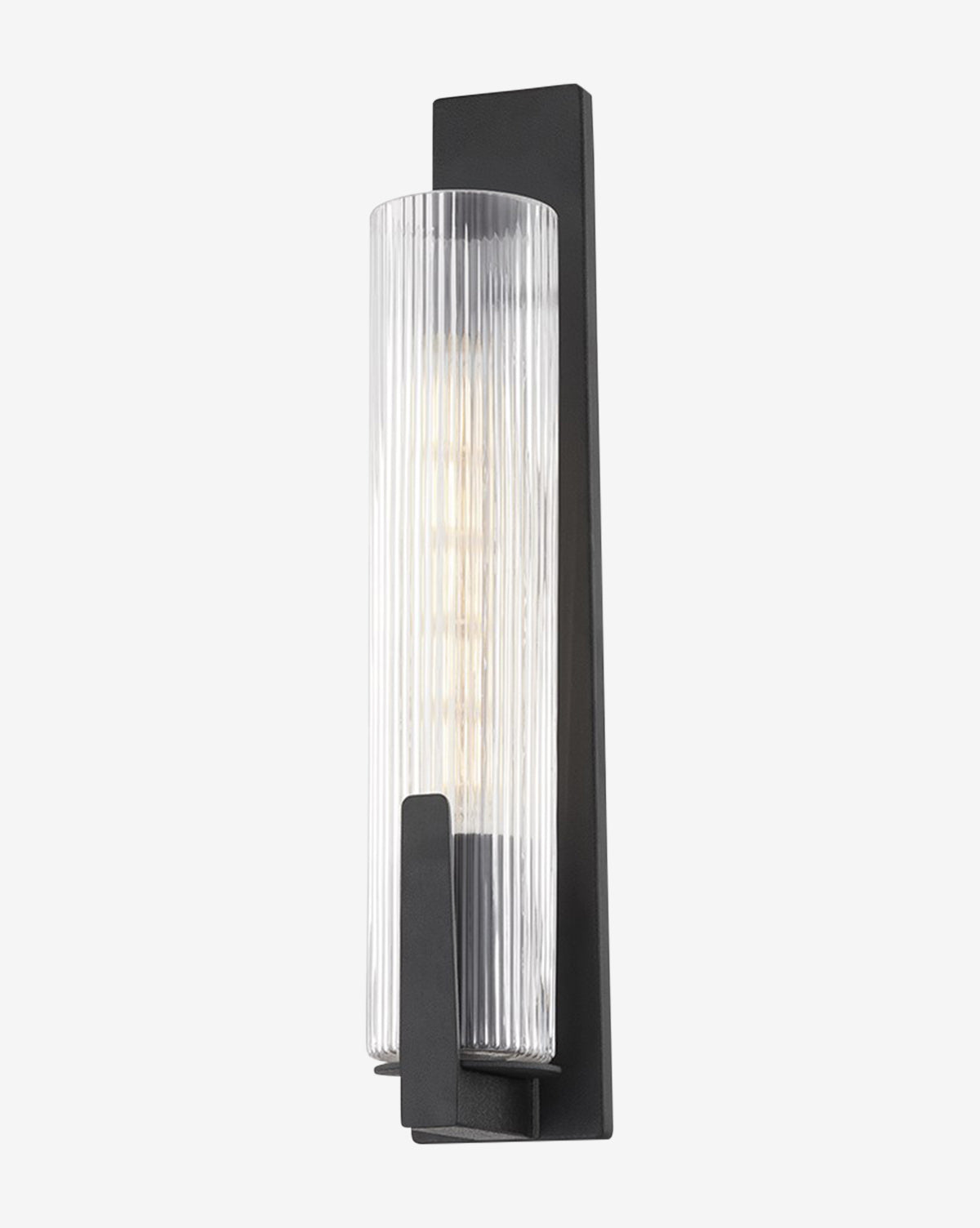 The Malakai Sconce by Troy Lighting showcases a vertical ribbed glass shade and a black rectangular backplate, providing diffused light with a visible bulb for a modern look. McGee & Co.
