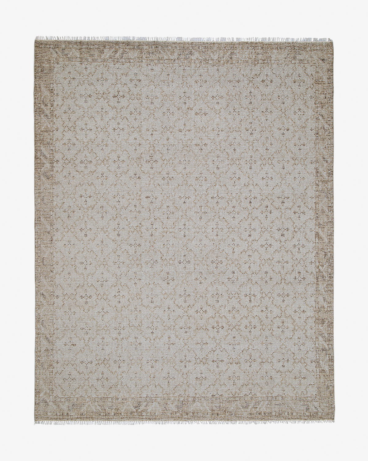 The Mali Hand-Knotted Rug is rectangular and beige, featuring a subtle, intricate floral pattern with short fringe on the shorter edges, displayed flat on a white background, by McGee & Co.
