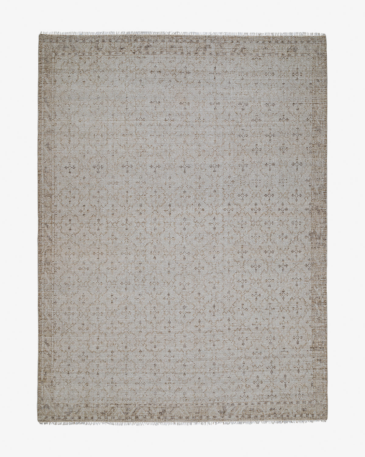 The Mali Hand-Knotted Rug is a square, light beige rug with subtle floral and geometric patterns and short fringe edges, offering a refined, neutral look with its delicate, evenly distributed design, by McGee & Co.