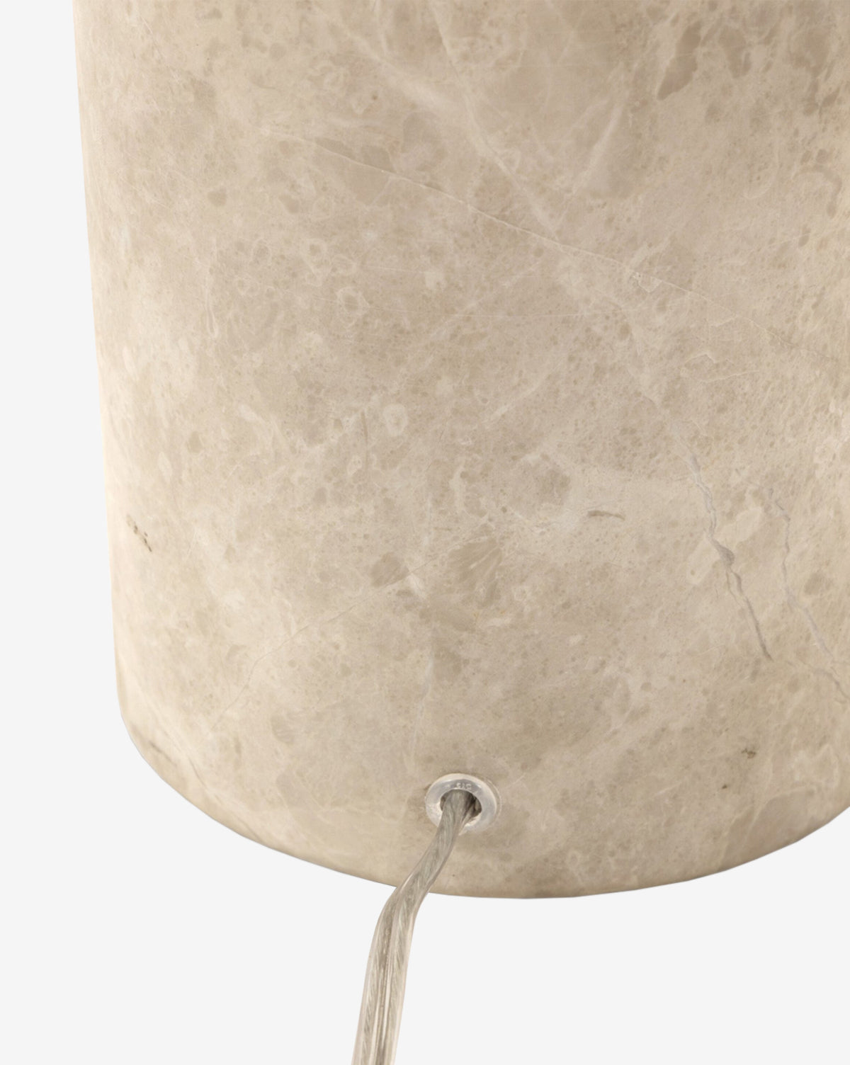 Close-up of the base of the Malinska Table Lamp, featuring a taupe marble finish with a light gray, marbled texture and a clear electrical cord emerging from a hole near the bottom, by McGee & Co.