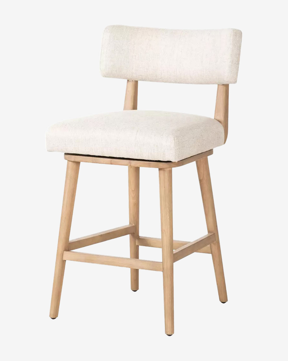 The Mance Swivel Stool by Four Hands is a modern counter-height kitchen stool with light wood legs, a square upholstered seat, and a low rectangular cushioned back in light beige fabric. McGee & Co.