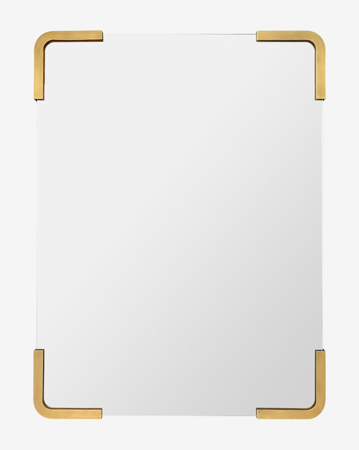 The Mare Mirror is rectangular with a plain surface and four rounded antique brass brackets on each corner, set against a white background for a modern look, by McGee & Co.