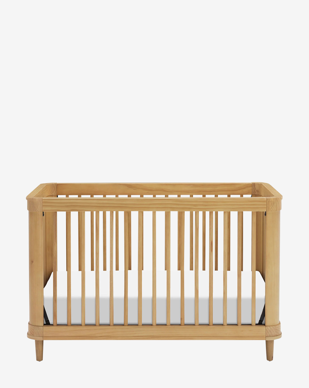 The Marin with Cane 3-in-1 Convertible Crib, with a natural wood finish, vertical slats, and white mattress, stands against a plain white background—an elegant addition to your nursery furniture collection, by McGee & Co.