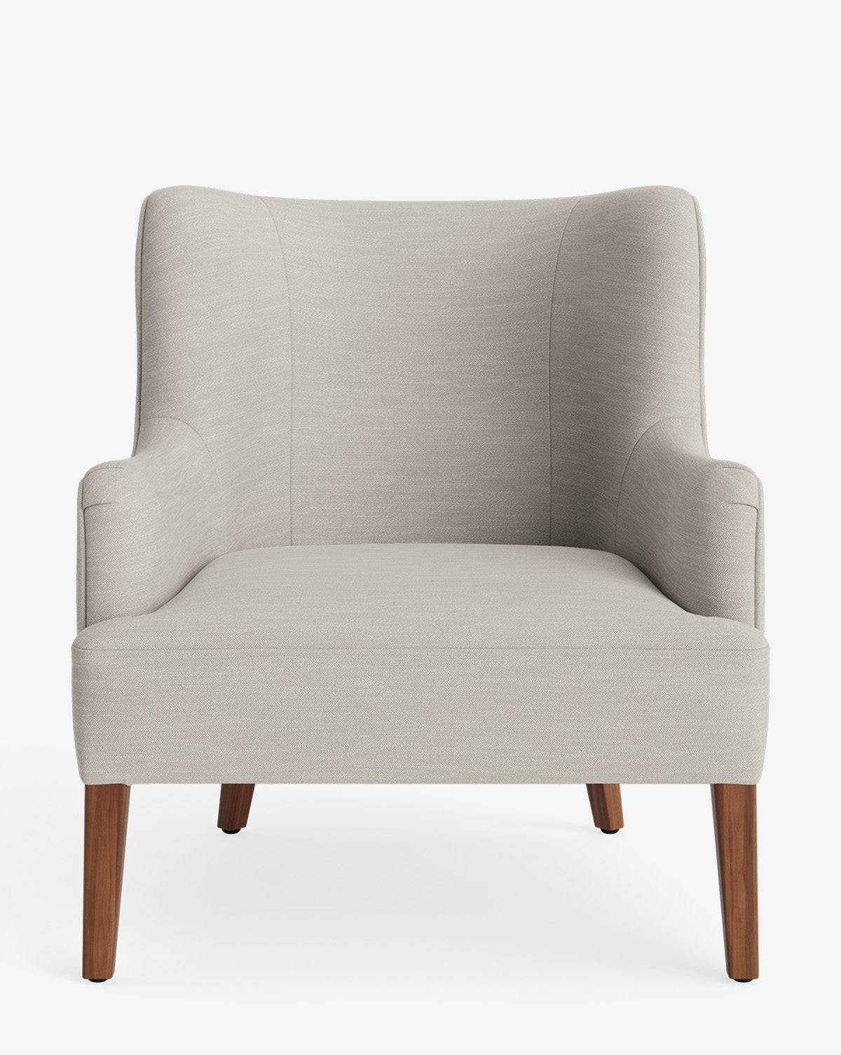 The Marion Lounge Chair features light gray performance fabric, a high wingback design, and four angled wooden legs, shown against a plain white background by McGee & Co.