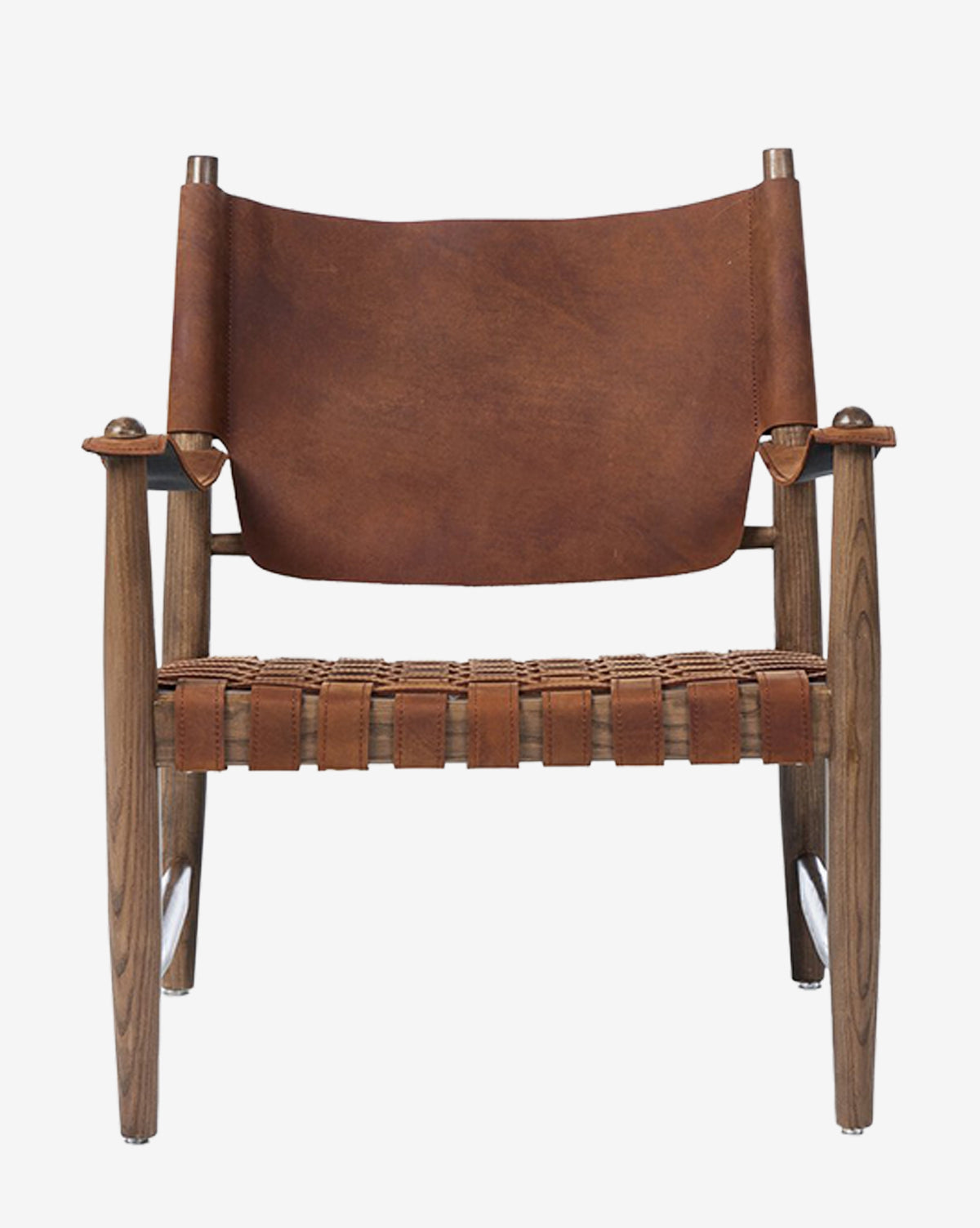 The Maris Lounge Chair has a vintage design with a wooden frame, top-grain leather sling backrest, and woven leather seat, shown from the front on a white background by McGee & Co.