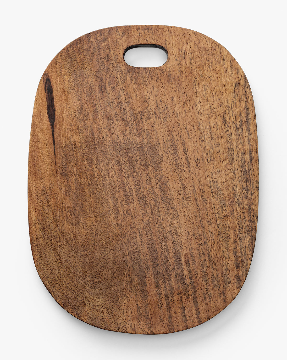 The Marlton Breadboard is a large, oval wooden serving board with a smooth surface and a rounded rectangular handle at the top, perfect for artisanal kitchen decor, shown against a white background by McGee & Co.