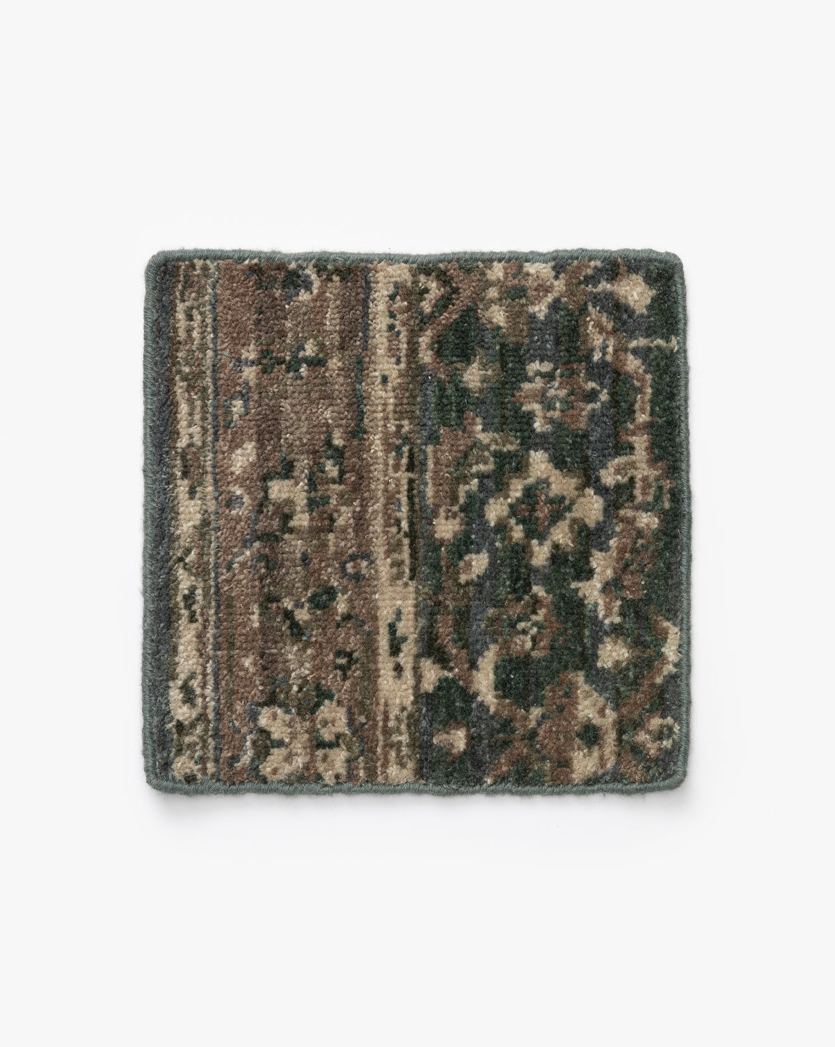 A Marta Hand-Knotted Rug Swatch with a textured, multicolored pattern in brown, tan, and dark green, reminiscent of a classic border rug, is displayed on a white background by McGee & Co.