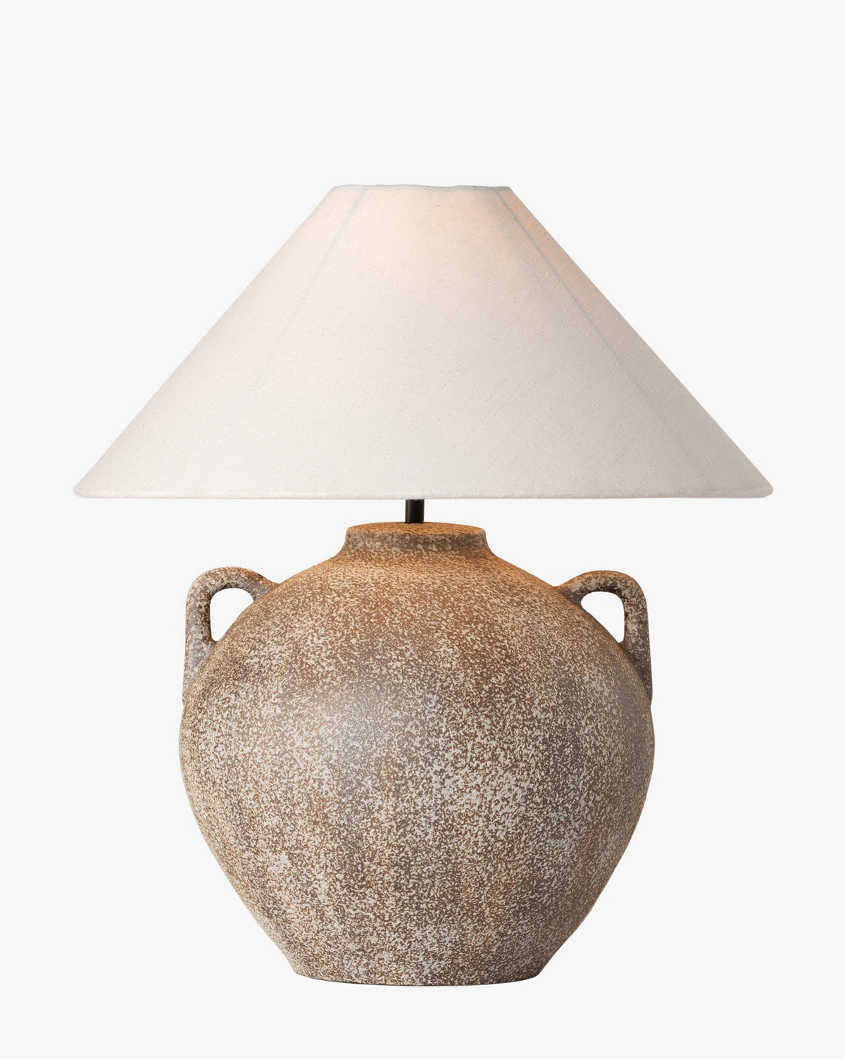 The Mays Table Lamp features a rustic, round textured ceramic base with two small handles, evoking a vintage clay jar style, and is topped with a wide white conical fabric lampshade by McGee & Co.