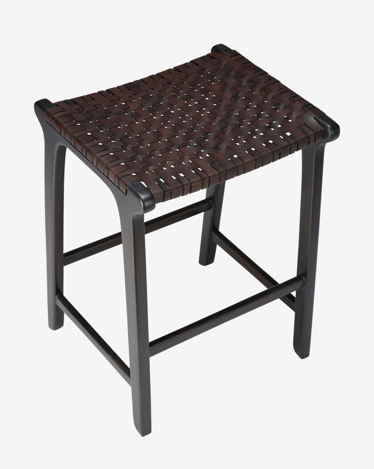 The Meliora Counter Stool by Made Goods features a dark teak frame with four sturdy legs, woven leather seat, and horizontal support bars for added stability. McGee & Co.