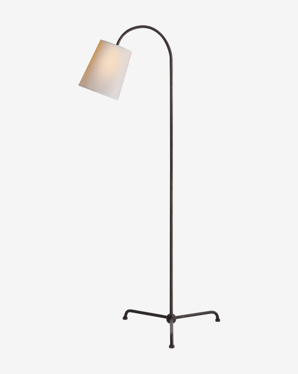 The Mia Floor Lamp by Visual Comfort & Co. Signature features a modern black metal curved arm, a three-legged base, and a white, slightly tilted lampshade that emits soft light—McGee & Co.