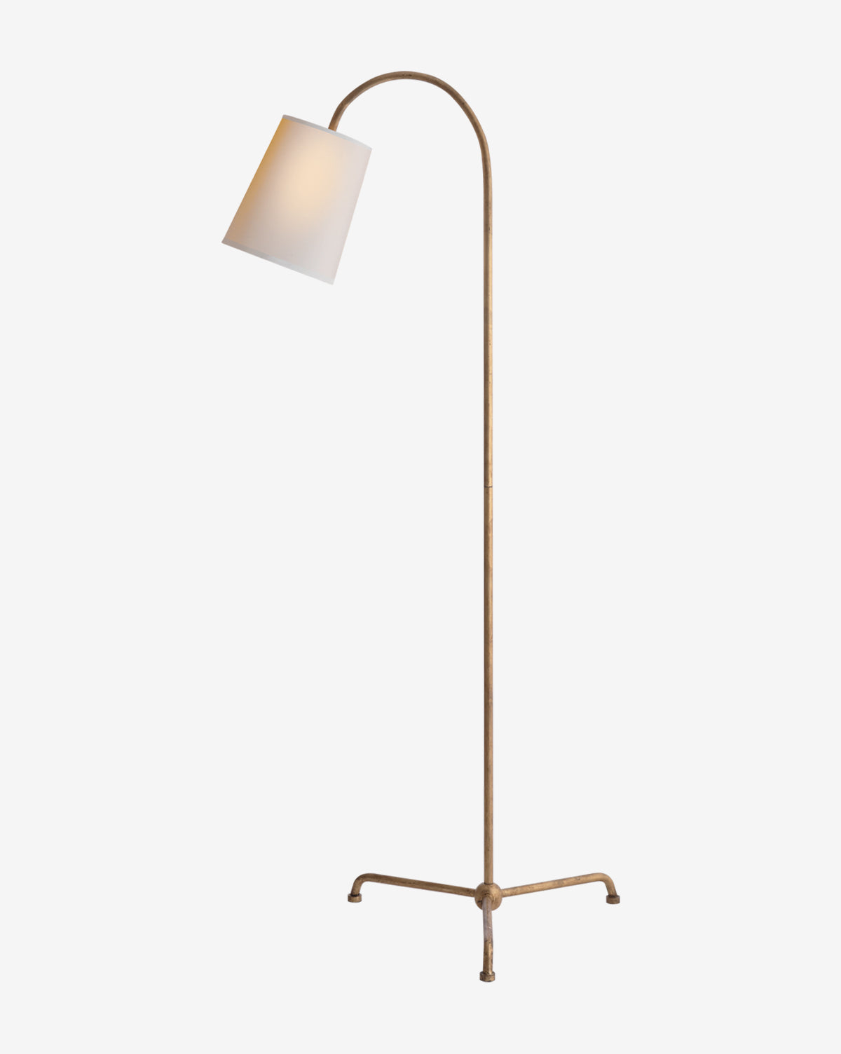 The Mia Floor Lamp showcases elegant lighting with a tall brass body, curved arm, white cone-shaped lampshade, and three-legged base, by McGee & Co.