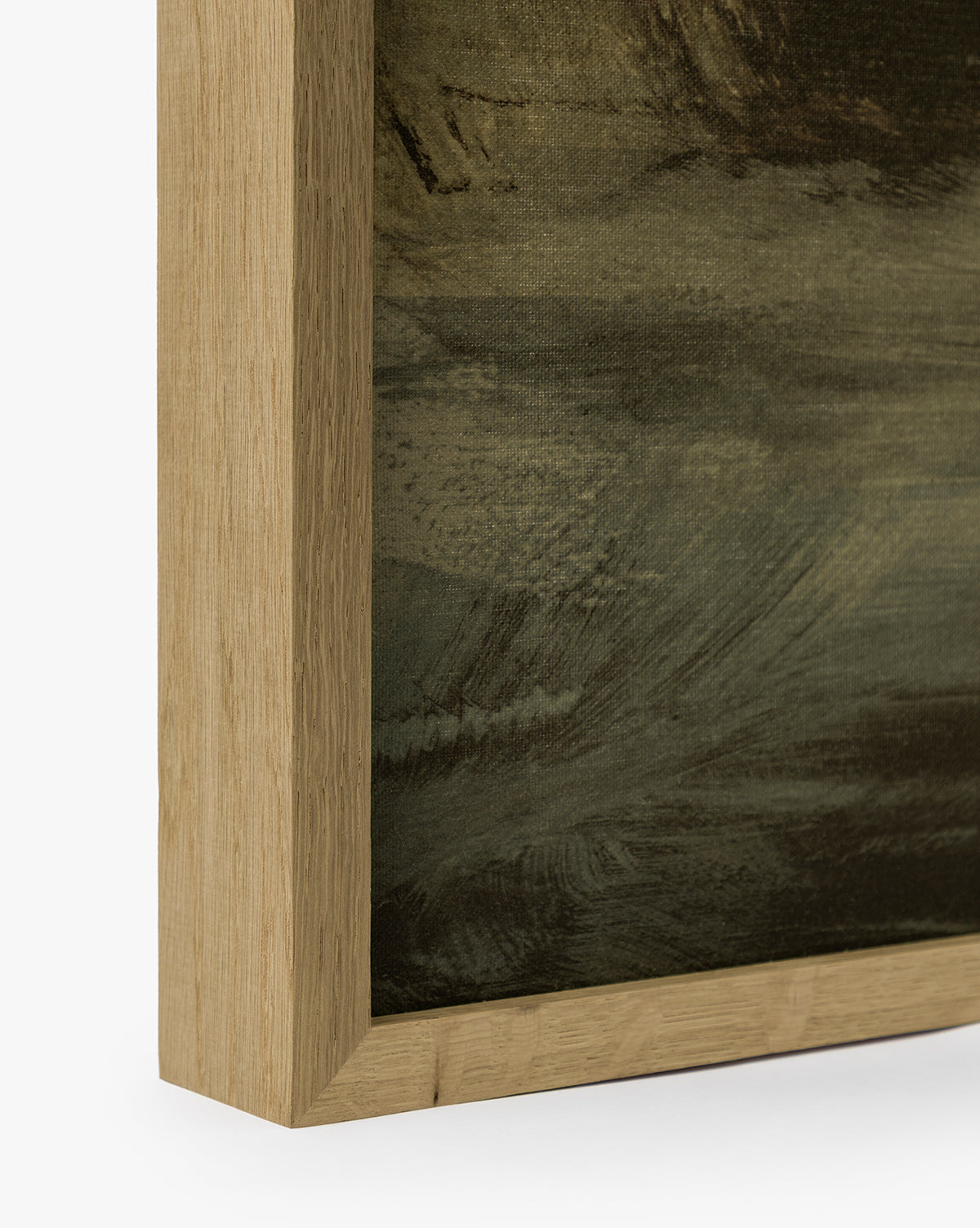 Close-up of the corner of a white oak frame holding Misty Blue Headland, a painting with textured, dark green and brown brushstrokes. The natural light wood finish enhances the artworks rich colors, by McGee & Co.