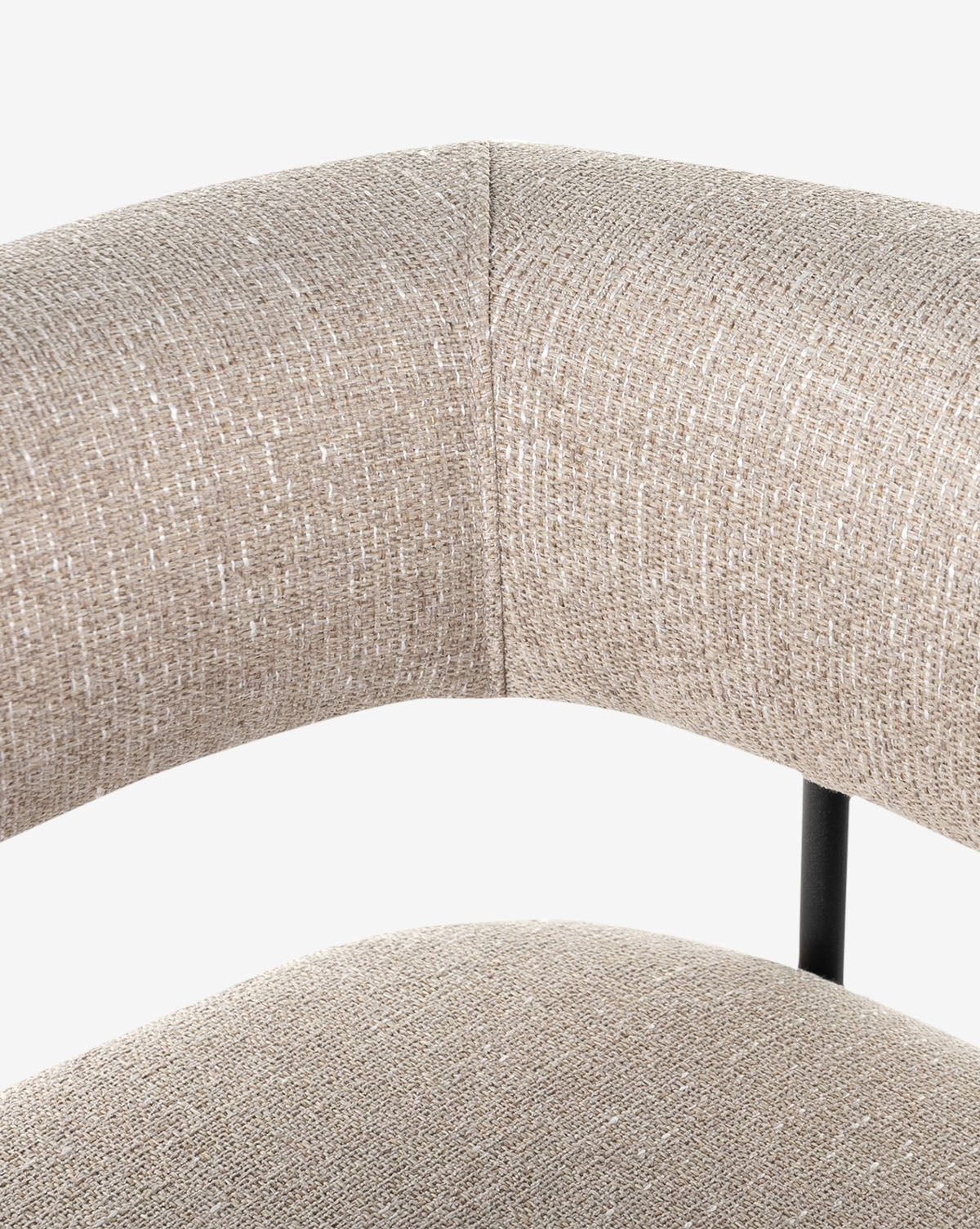 Close-up of the Monson Stools backrest and seat, showcasing its curved design and textured light beige upholstery, by McGee & Co.