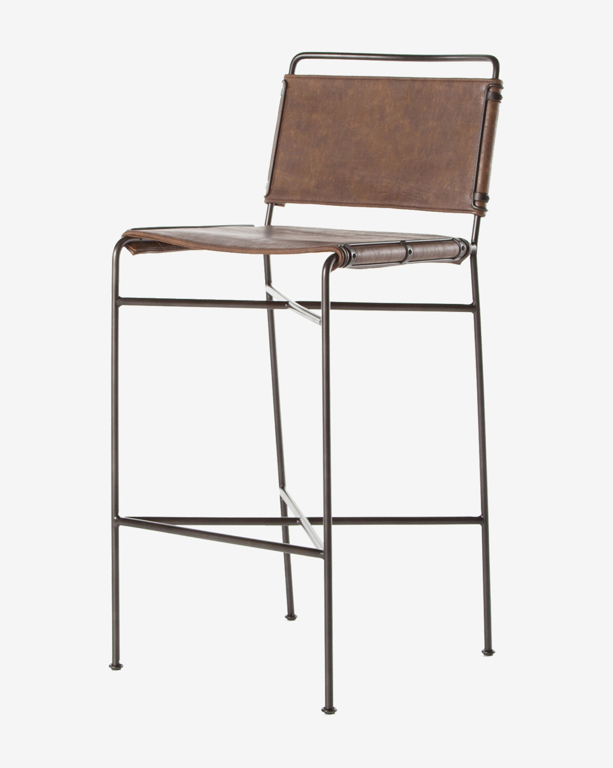 The Moore Stool features a brown leather seat and backrest with a black metal frame, slender legs, and a simple footrest, adding industrial style to any space, by McGee & Co.