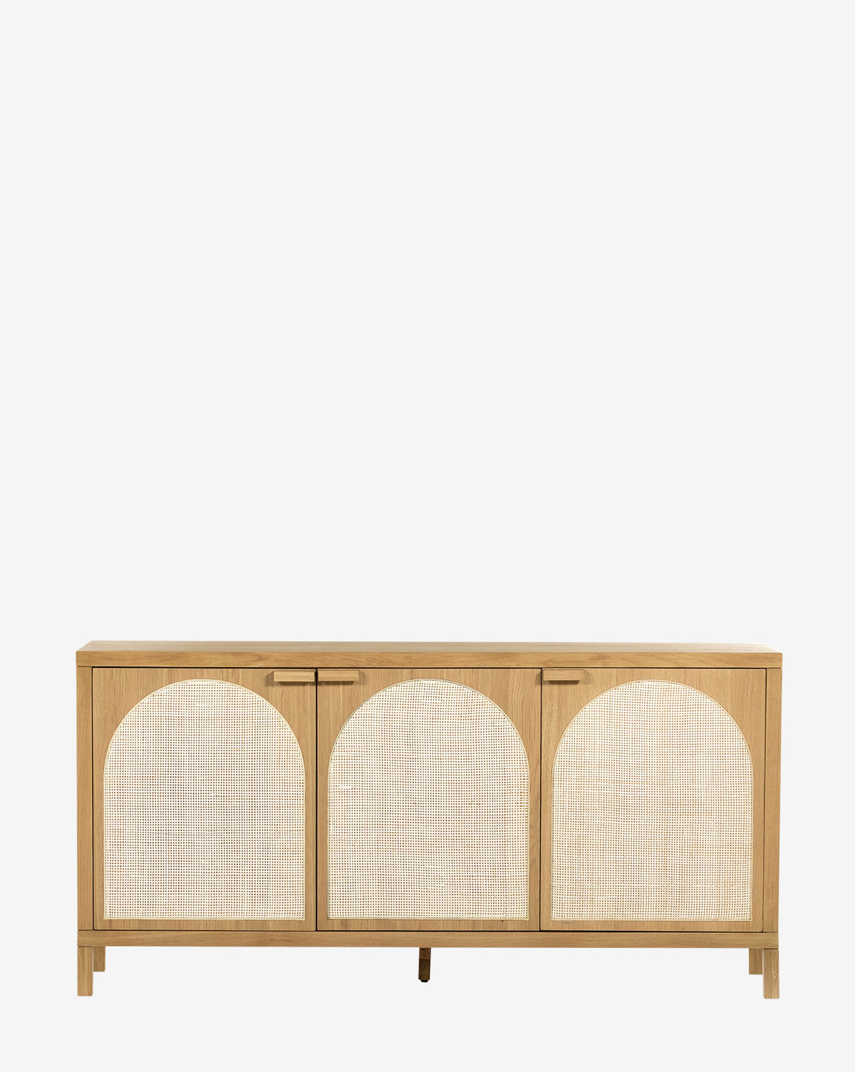 The Mora Sideboard features three doors with woven rattan panels and arched designs. It has a light natural finish, minimalist handles, and stands on short legs for a timeless mid-century look by McGee & Co.
