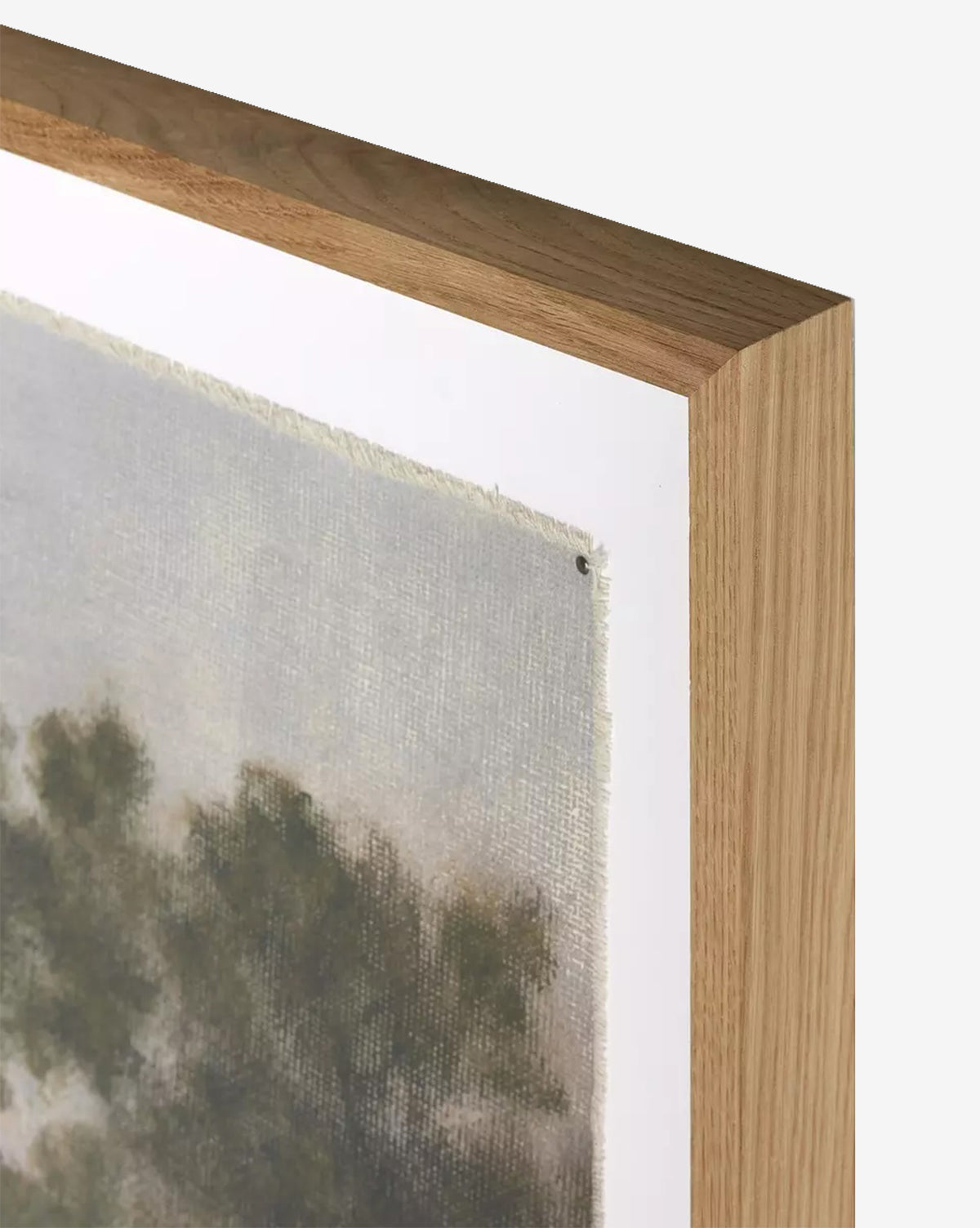 Close-up of the corner of a wooden picture frame featuring Morning Glory by Aileen Fitzgerald, an expressive canvas artwork with muted colors and visible texture, set against a plain light background, by McGee & Co.