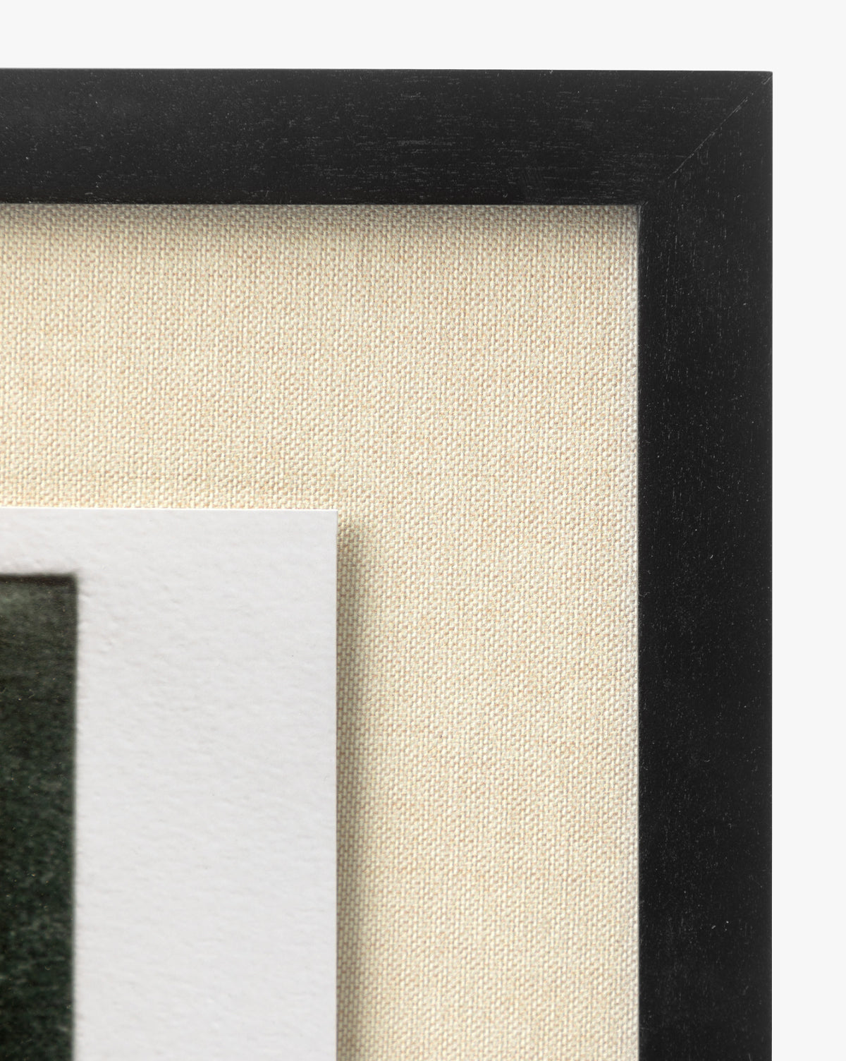 Close-up of a black American Maple frame with a beige textured mat, holding Muted Path Green by Carol Haymon—a white-bordered giclee print—for a clean, modern display ideal for showcasing artwork.