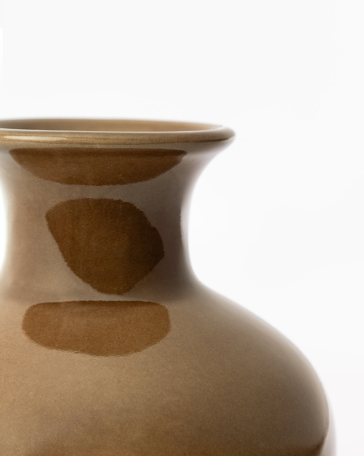 Close-up of the upper section of the glossy brown Natalia Vase, featuring a rounded body and narrow neck, photographed against a plain white background, by McGee & Co.