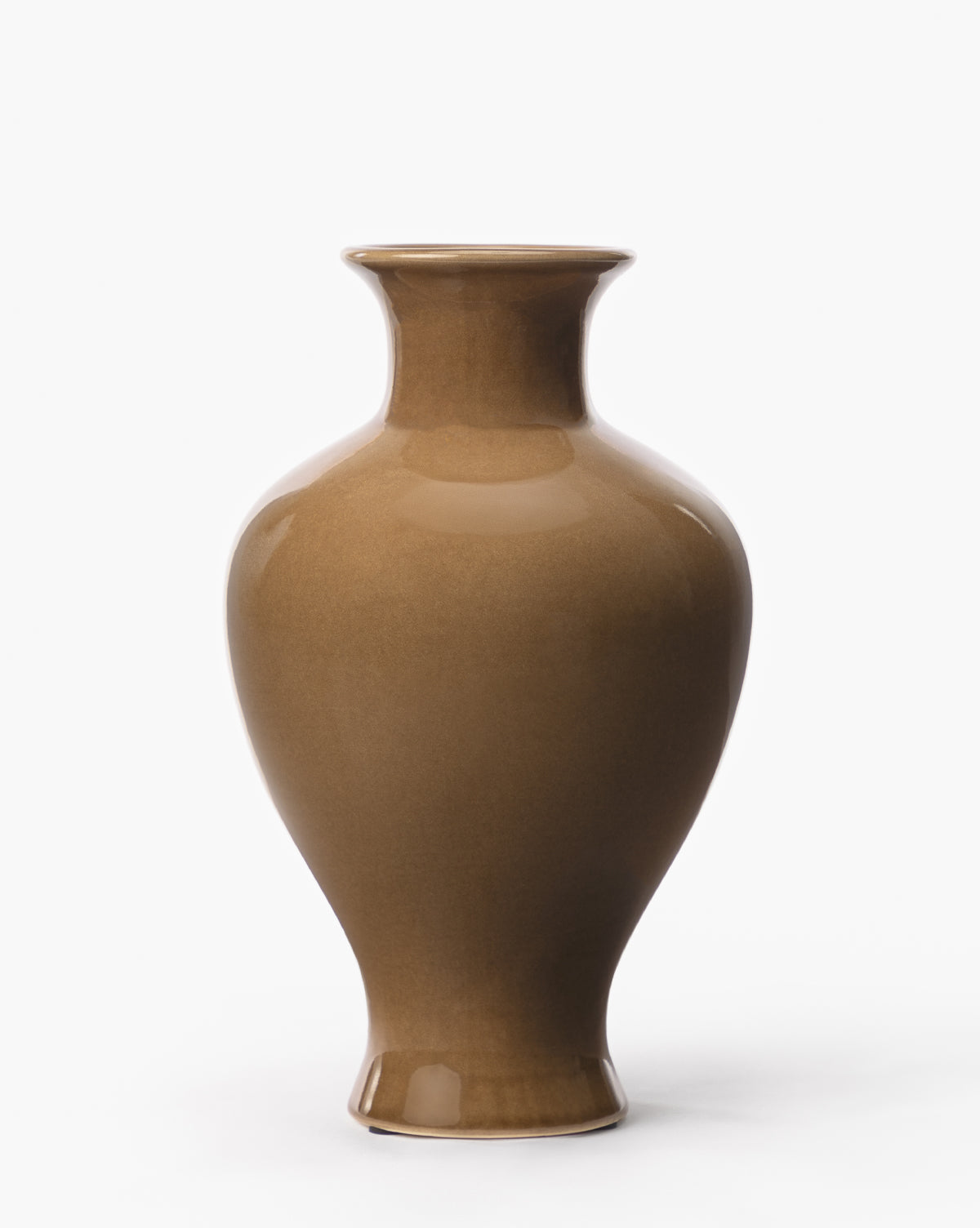 The Natalia Vase is a glossy, brown earthenware piece featuring a wide body, narrow neck, and flared rim, shown against a plain white background, by McGee & Co.