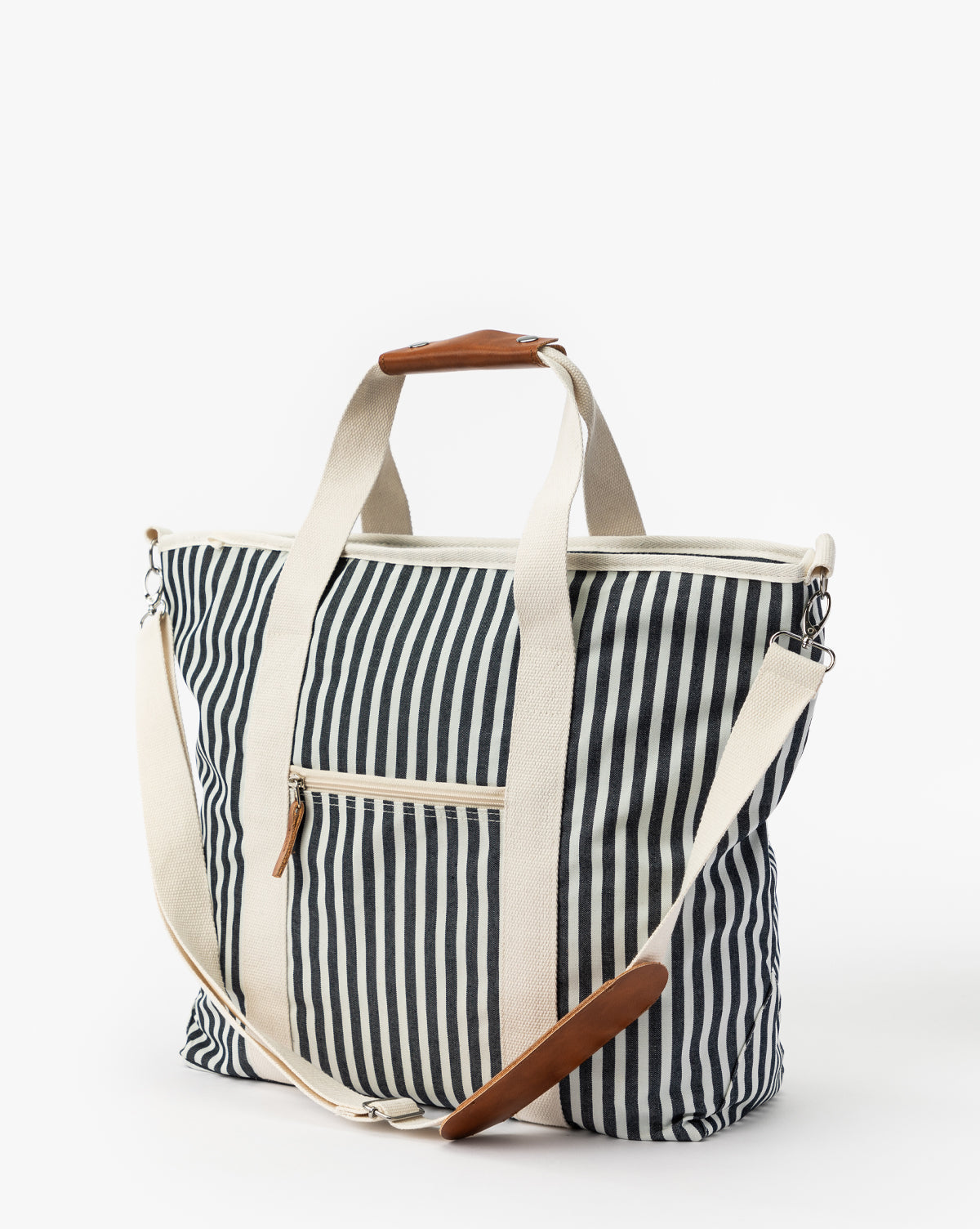 Close-up of Navy Striped Cooler Bag’s striped fabric, highlighting waterproof construction, from McGee & Co.