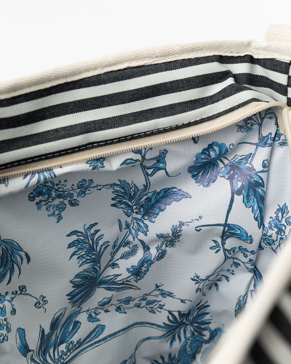 Close up of interior detail of the Navy Striped Cooler Bag in profile, from McGee & Co.