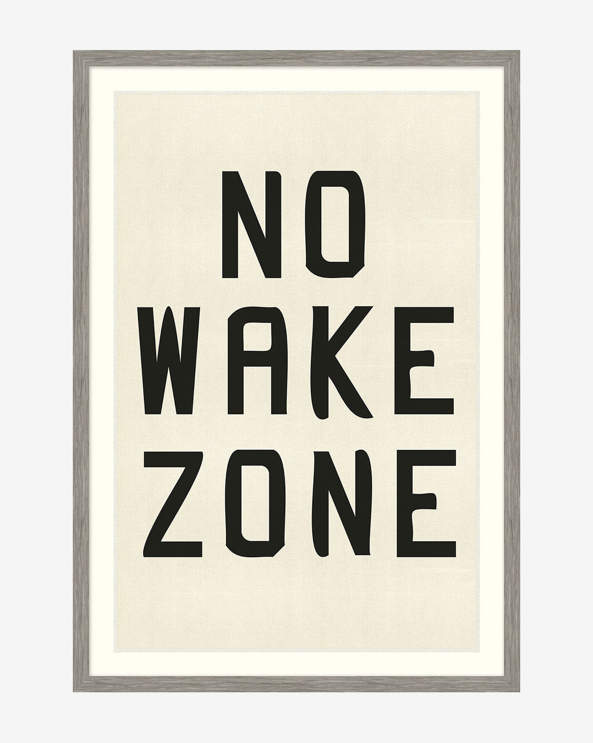 The No Wake Zone sign is displayed in bold black letters on a white background and framed in a shadowbox style.
