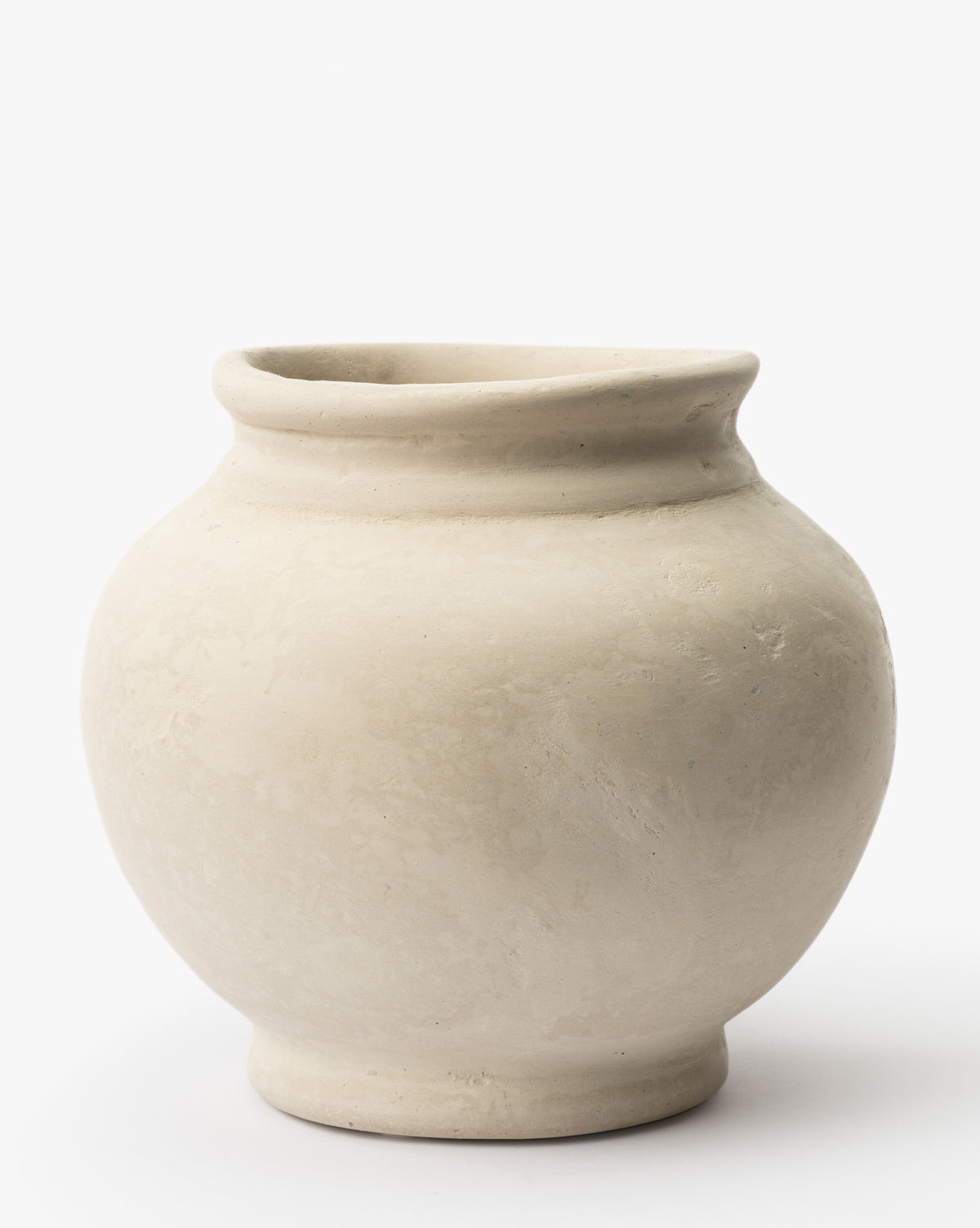 The BIDK Home Nola Paper Mache Vase features a round, off-white design with a wide body, narrow base, and slightly flared rim, shown against a plain white background, McGee & Co.