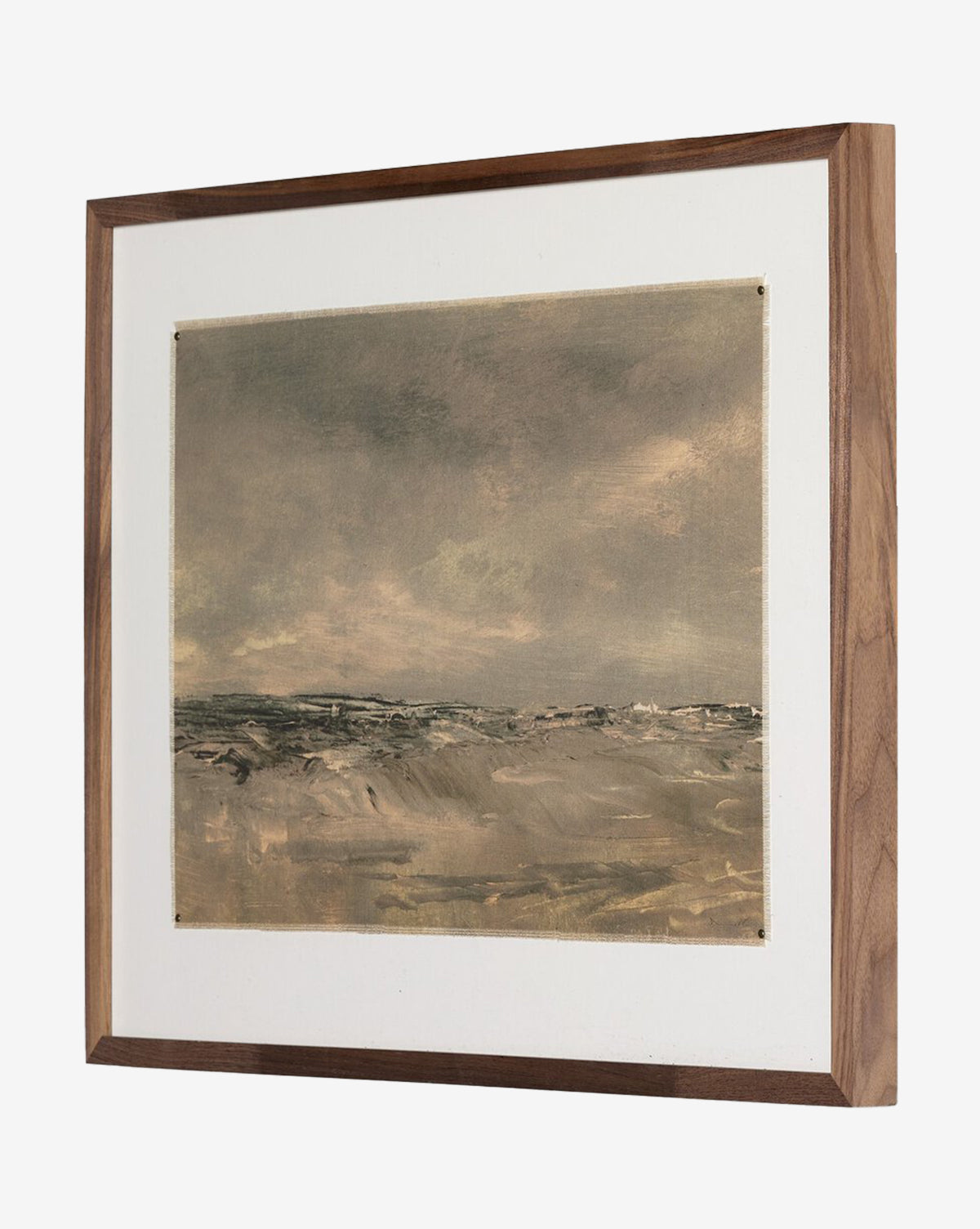 North Wind by Dan Hobday is a framed painting featuring a cloudy sky over a sandy, windswept landscape. Muted beige, gray, and brown tones evoke mood, complemented by a simple wooden frame and white mat, by McGee & Co.