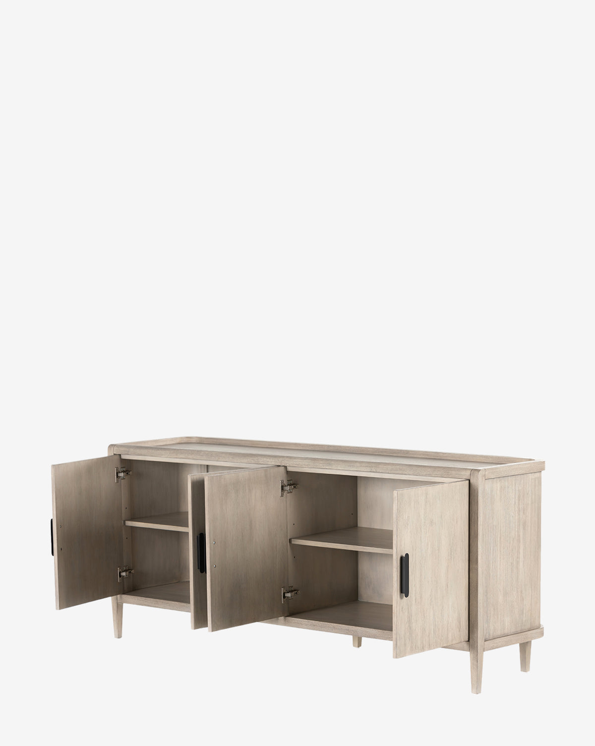 The Nyx Sideboard showcases solid mahogany in a light wood finish, four legs, black rectangular handles, two open cabinet doors, and adjustable shelves for versatile storage, by McGee & Co. Displayed against a plain white background.