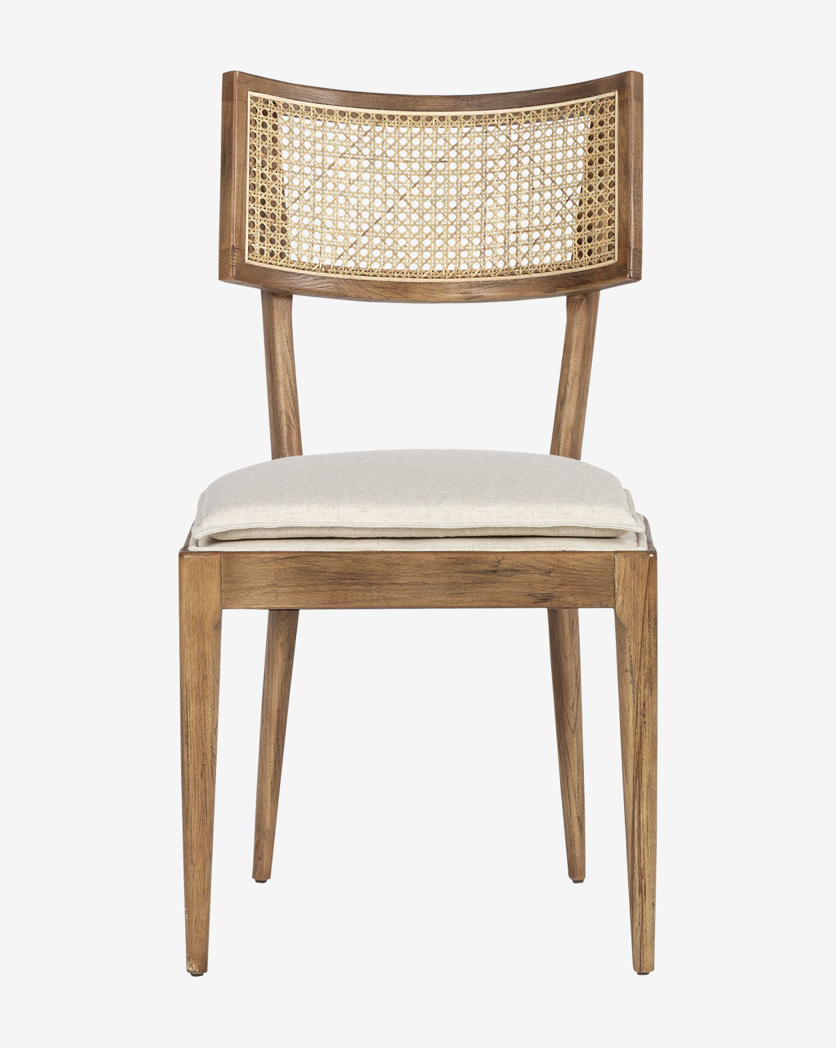 The Odelle Dining Chair features a wooden frame with an inlaid, curved woven cane backrest, a cushioned beige seat, tapered legs, and a minimalist design, by McGee & Co.