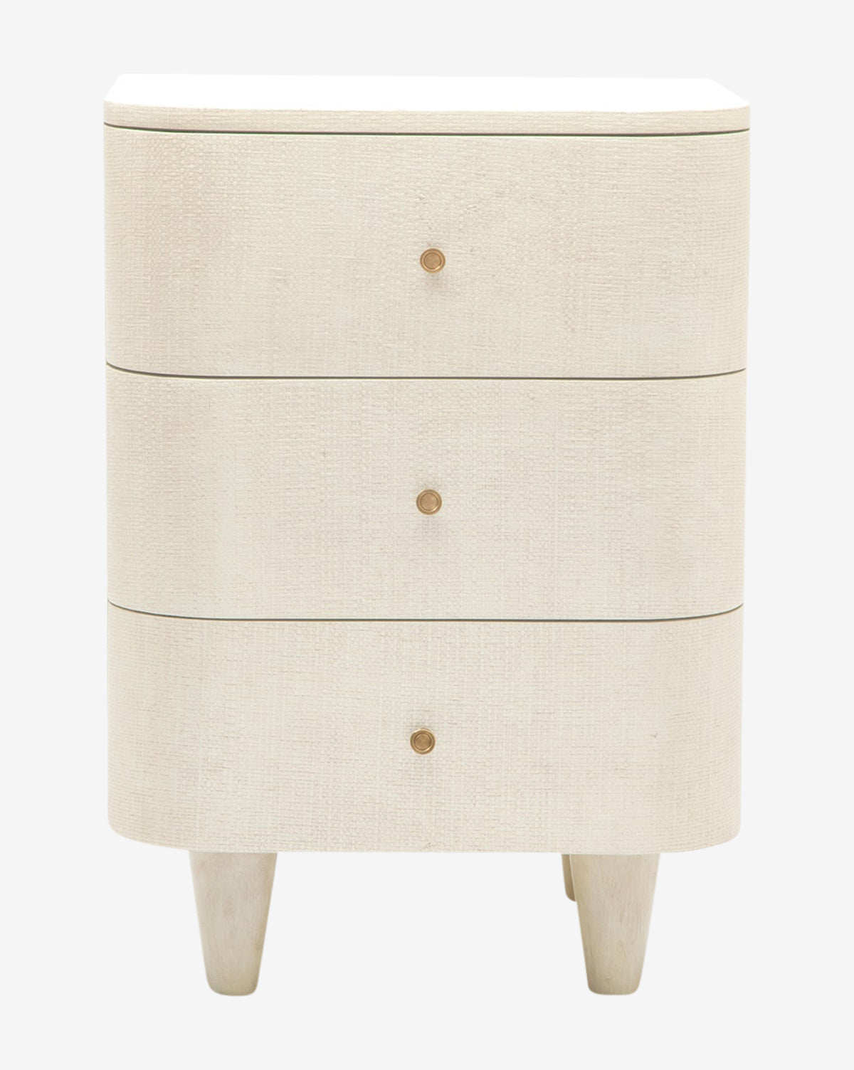 The Olinda Nightstand is a beige, three-drawer piece with rounded edges and brass pulls, supported by four short tapered legs—an elegant modern accent for bedrooms, shown here against a plain white background, by McGee & Co.