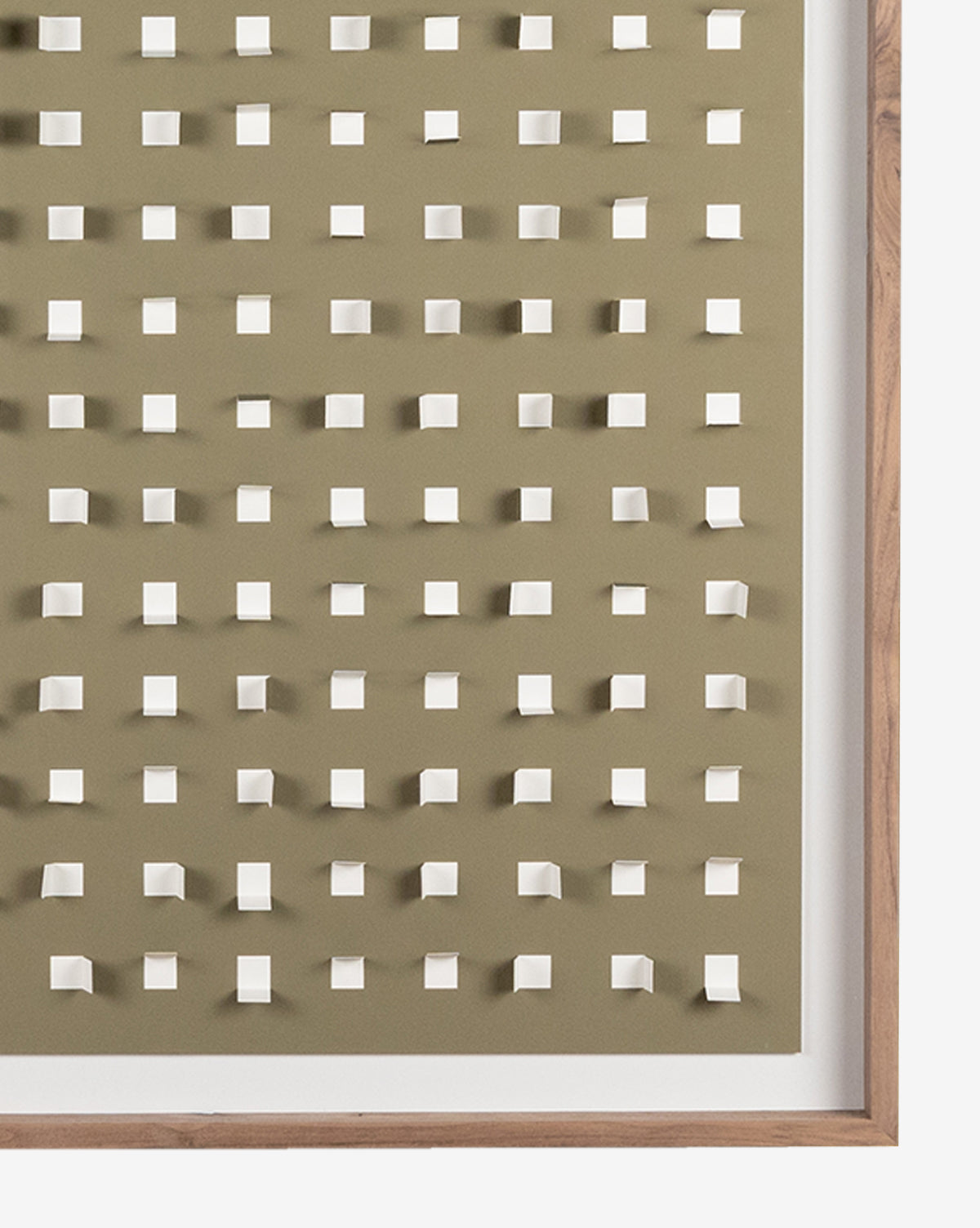 The Olive Grid features a walnut frame showcasing evenly spaced white square cutouts on a beige background, with select squares gently raised to create a striking three-dimensional textured design.