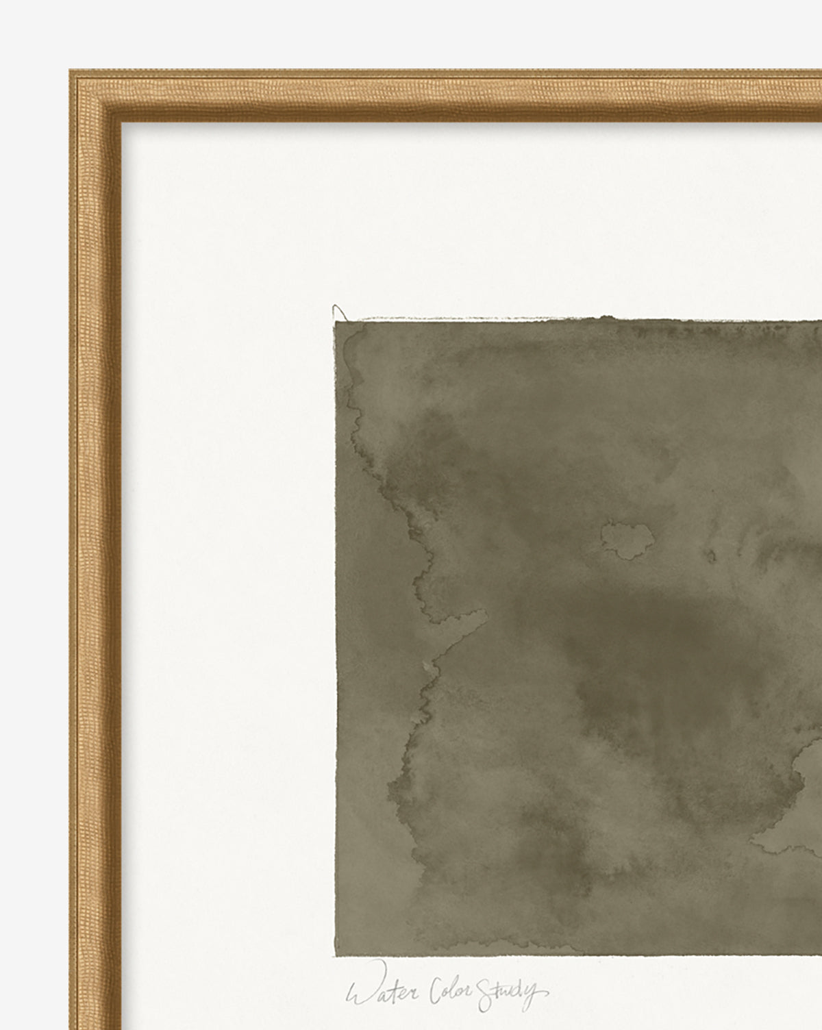 A close-up of Olive Study, a framed abstract art print featuring a textured, square olive green blotch on a white background, displayed in a light brown wood frame.