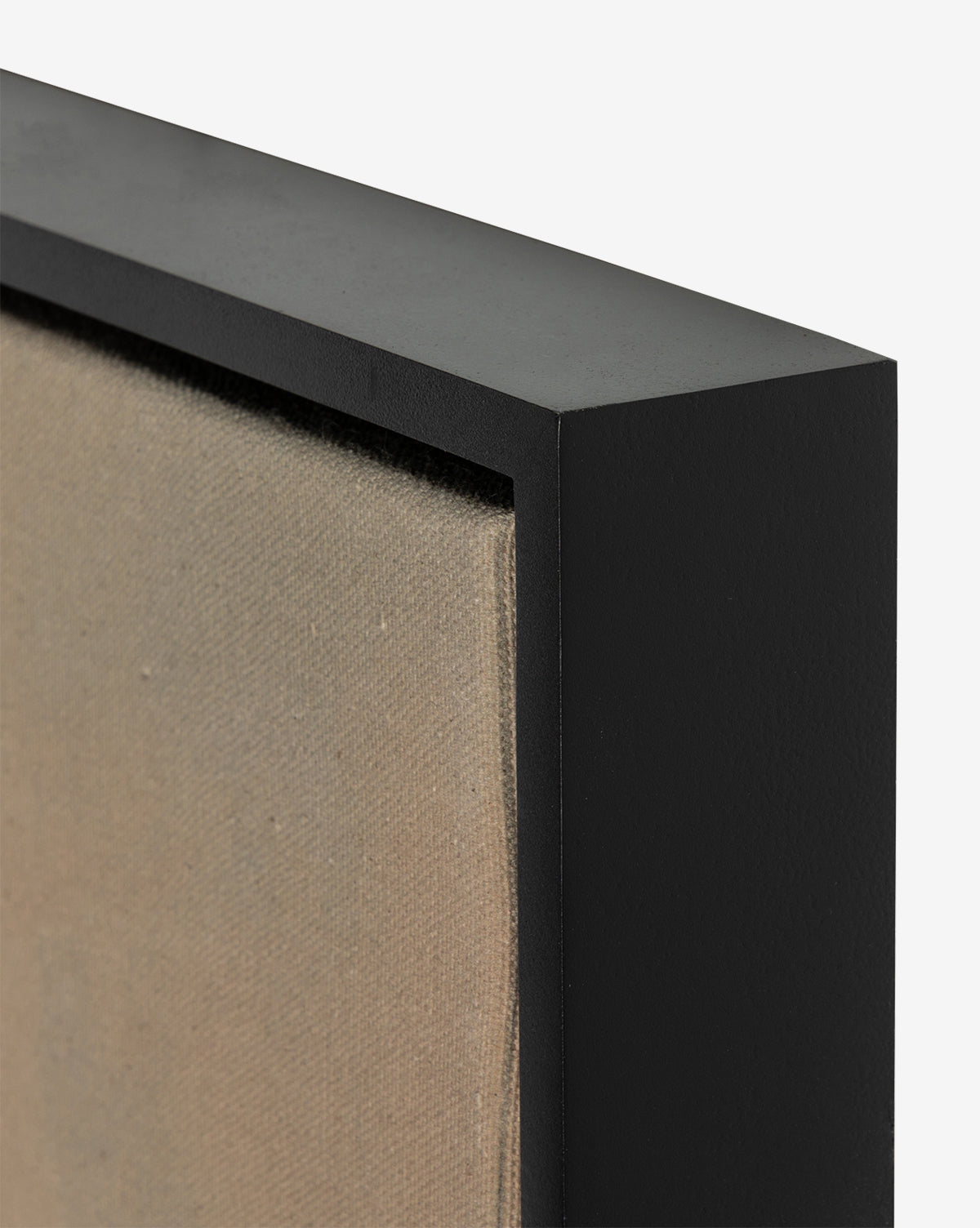 Close-up of the corner of Olive by Jess Engle, a gallery-quality canvas in a modern black rectangular frame, highlighting the canvas texture and matte frame finish—ideal for showcasing botanical wall art.