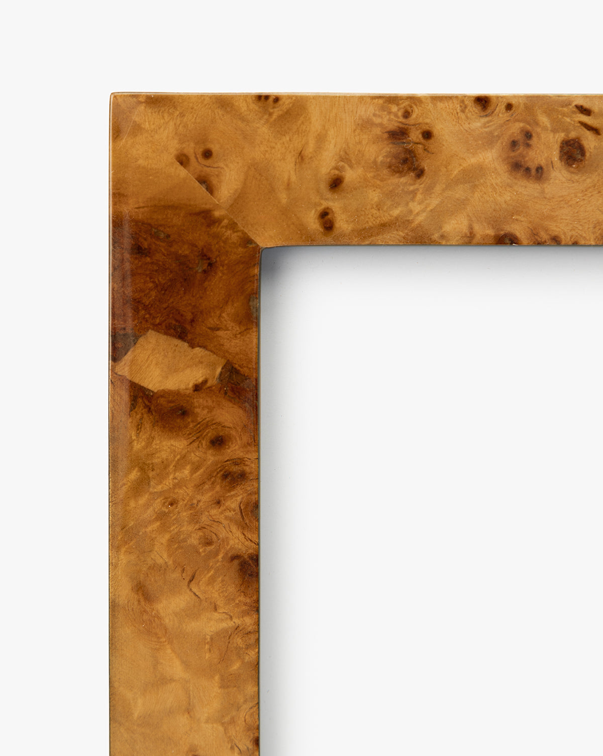 A close-up of the Oliver Burl 5x7 Frames (Set of 2) highlights their glossy, polished finish and natural wood grain—ideal for enhancing your home decor, by McGee & Co. The background is plain white.