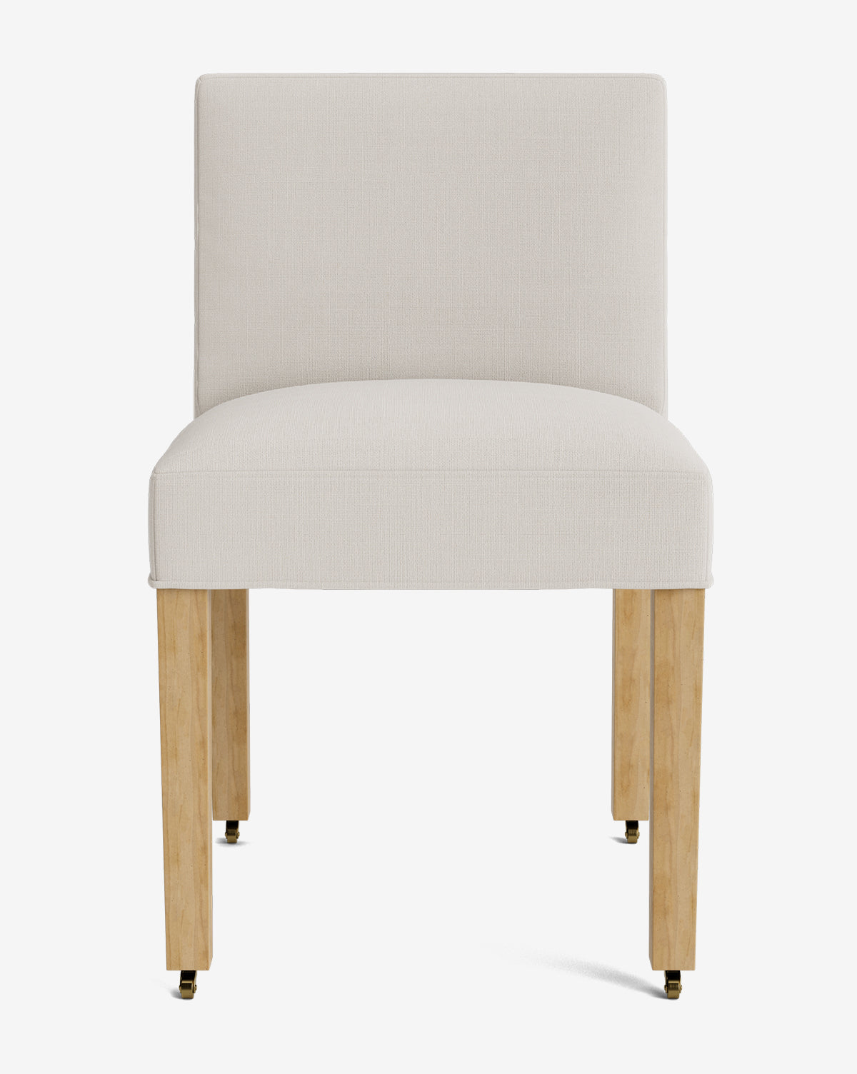 The Olivier Upholstered Dining Chair by Rowe Fine Furniture, Inc. features a modern design with a cushioned white fabric seat and backrest, four light wood legs, and brass casters on each leg, all set against a plain white background. McGee & Co.