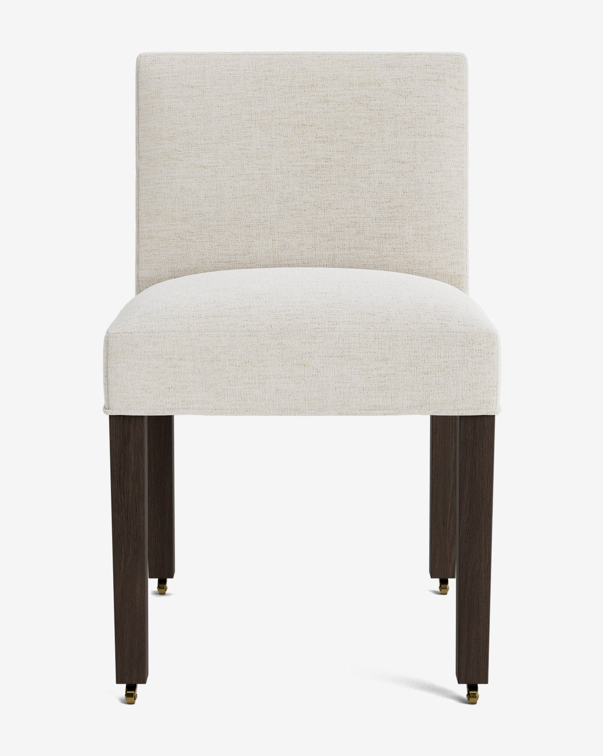 The Olivier Upholstered Dining Chair features a cream fabric seat and backrest, supported by four dark wooden legs with brass casters. Its simple, contemporary design brings a modern touch to any dining space by McGee & Co.